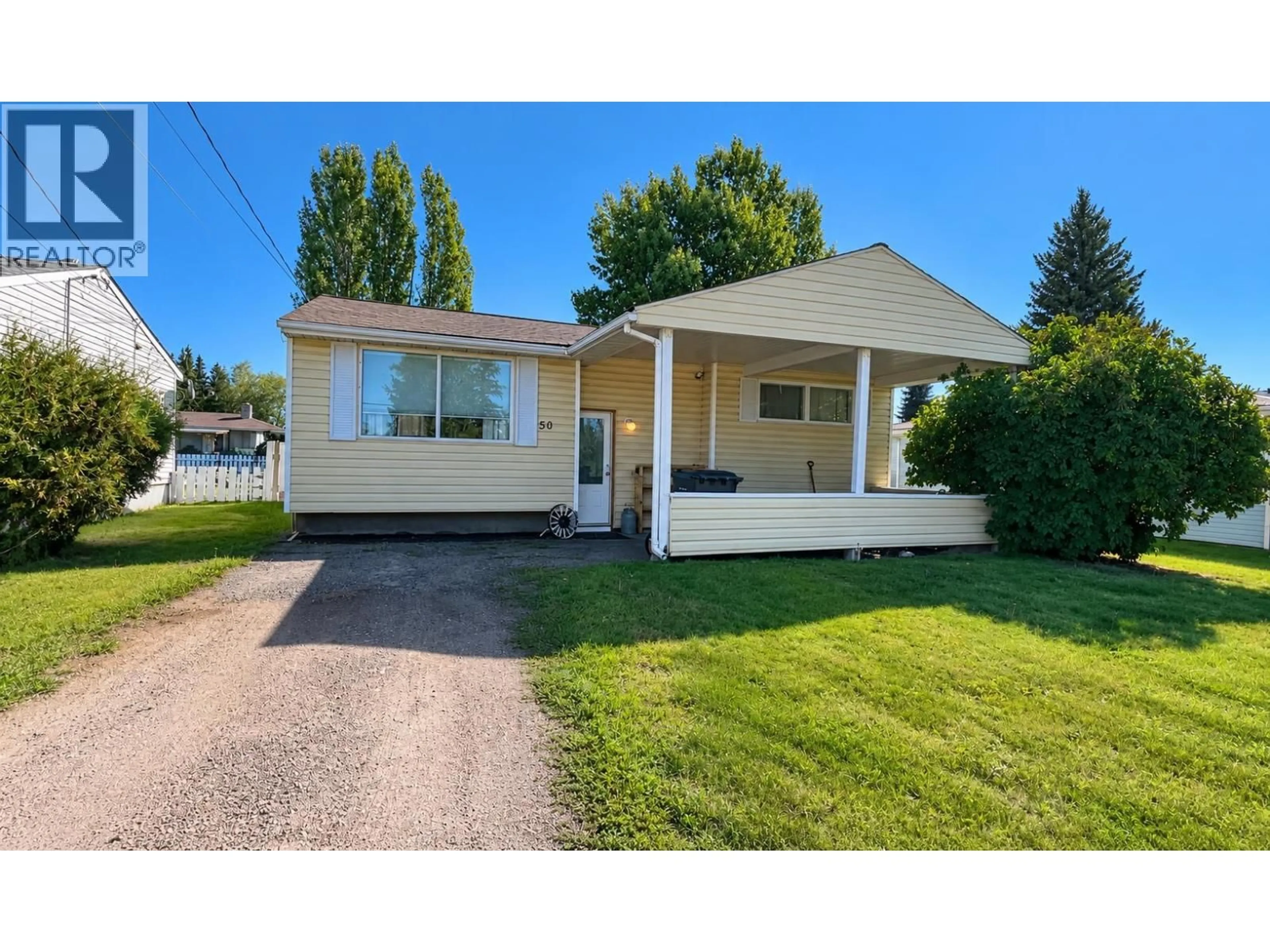 Home with vinyl exterior material, street for 50 CHOWSUNKET STREET, Fraser Lake British Columbia V0J1S0