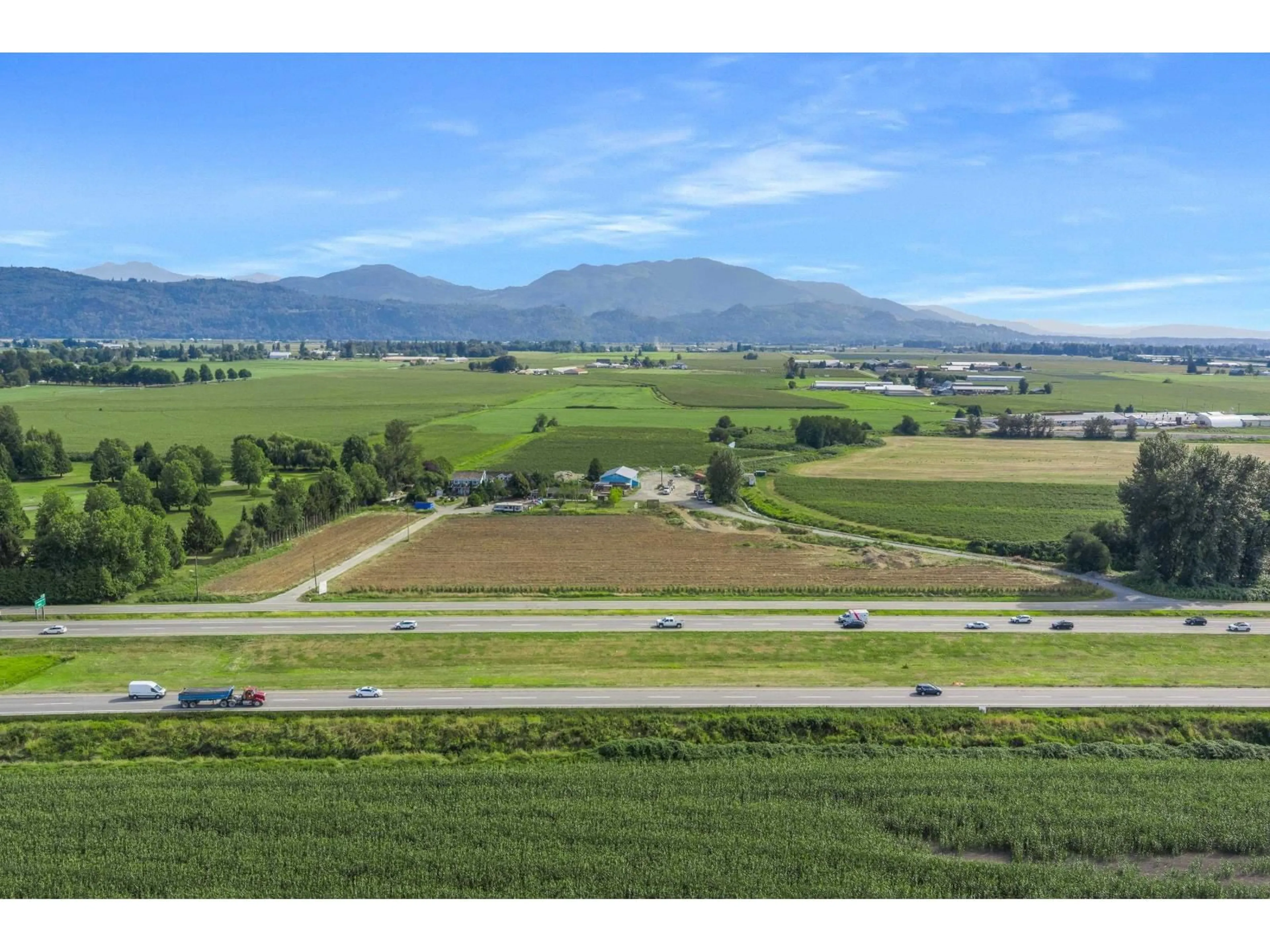 A pic from outside/outdoor area/front of a property/back of a property/a pic from drone, mountain view for 35826 SOUTH PARALLEL ROAD, Abbotsford British Columbia V3G2K4