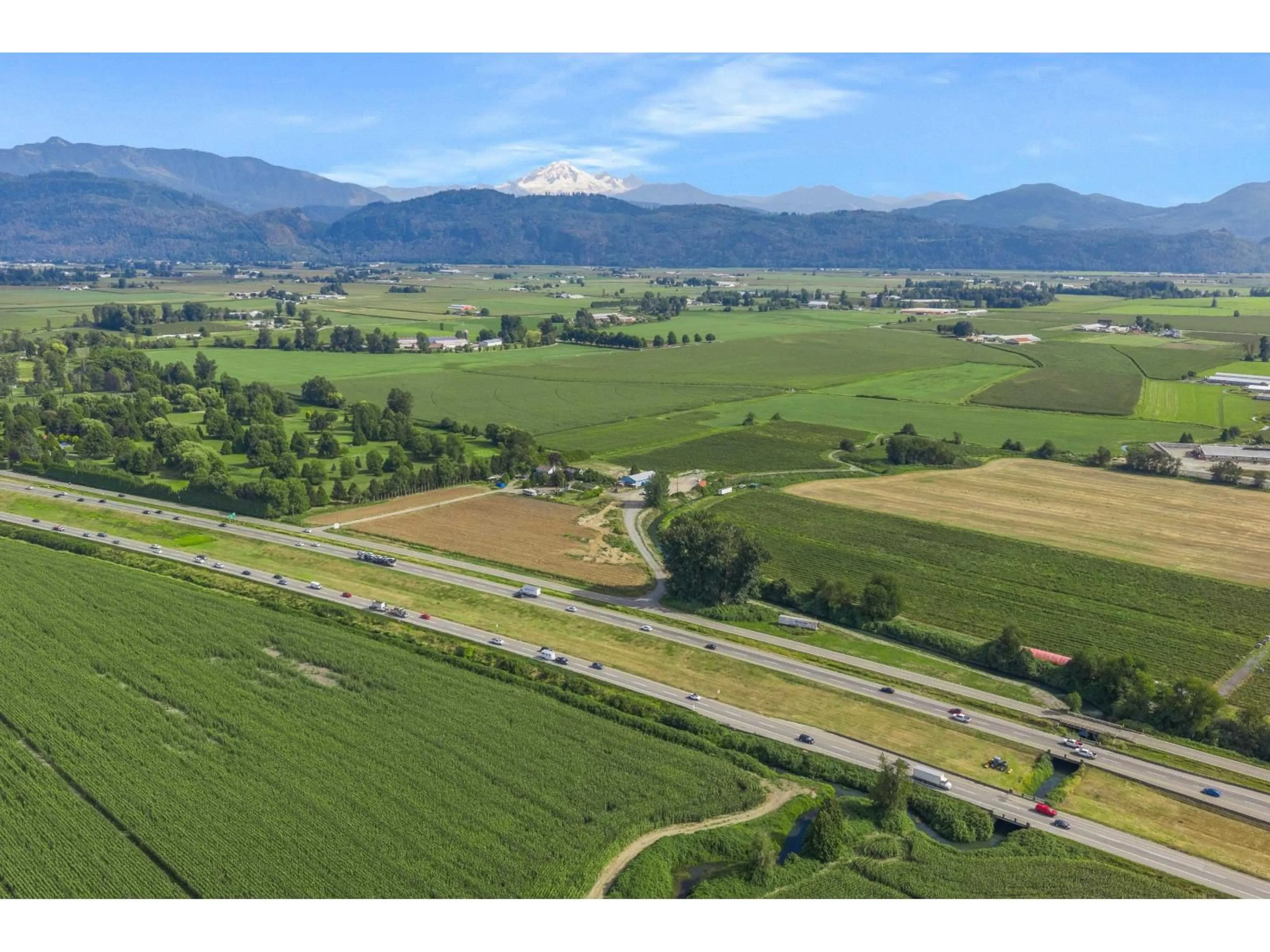 A pic from outside/outdoor area/front of a property/back of a property/a pic from drone, mountain view for 35826 SOUTH PARALLEL ROAD, Abbotsford British Columbia V3G2K4