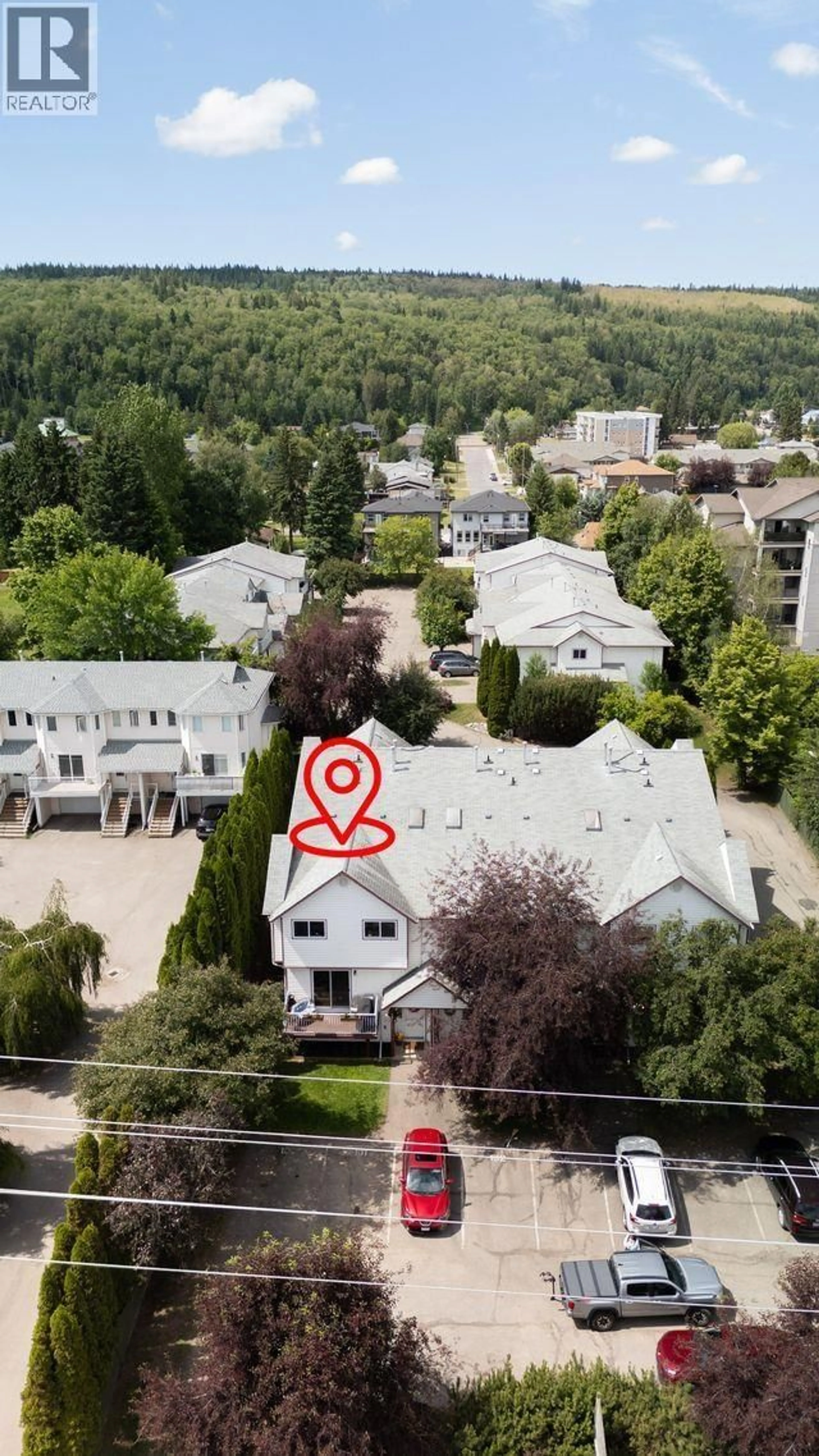 A pic from outside/outdoor area/front of a property/back of a property/a pic from drone, unknown for 101 - 3307 WESTWOOD DRIVE, Prince George British Columbia V2N1S4