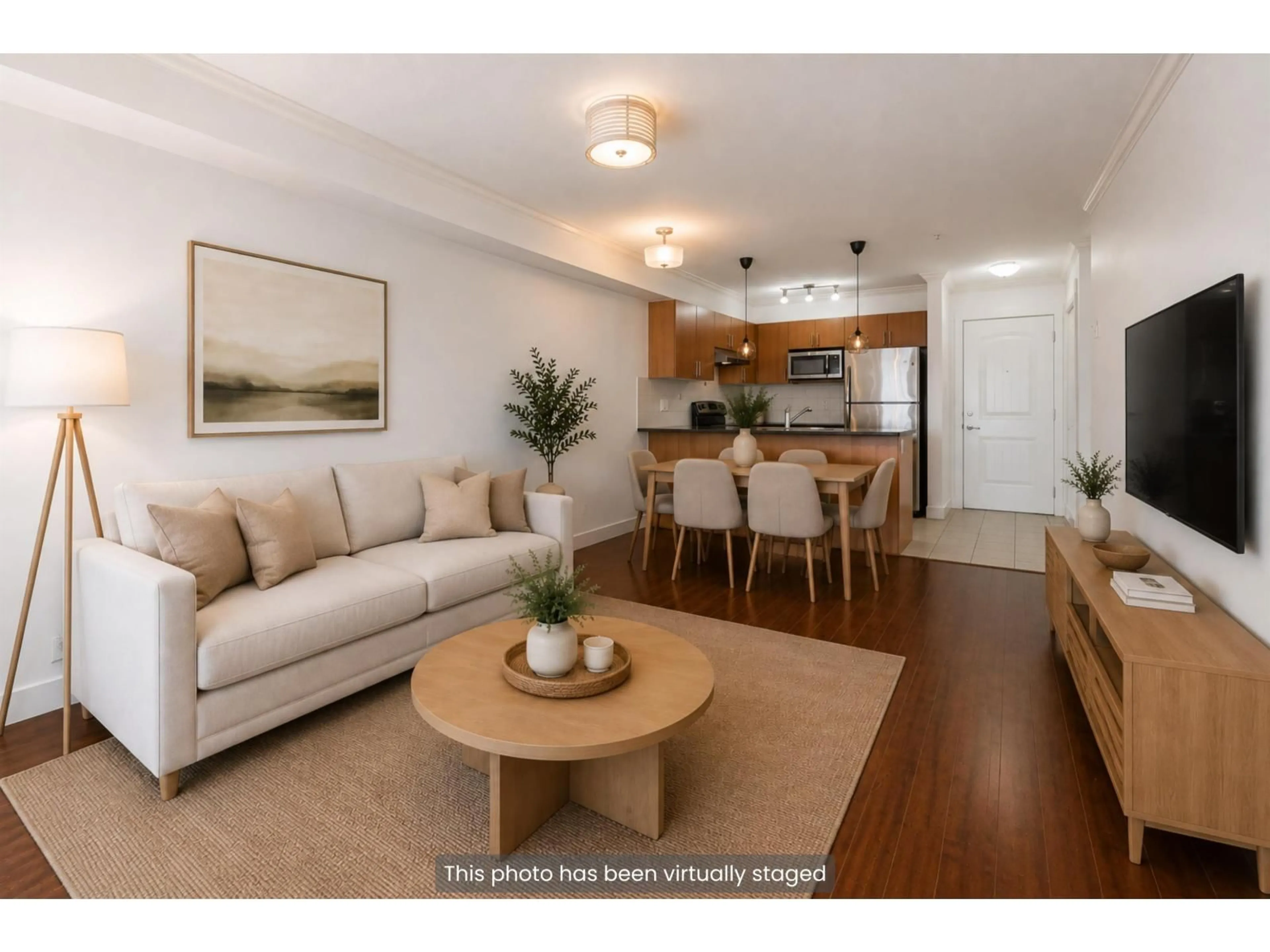 Living room with furniture, wood/laminate floor for 222 - 17769 57 AVENUE, Surrey British Columbia V3S1H1