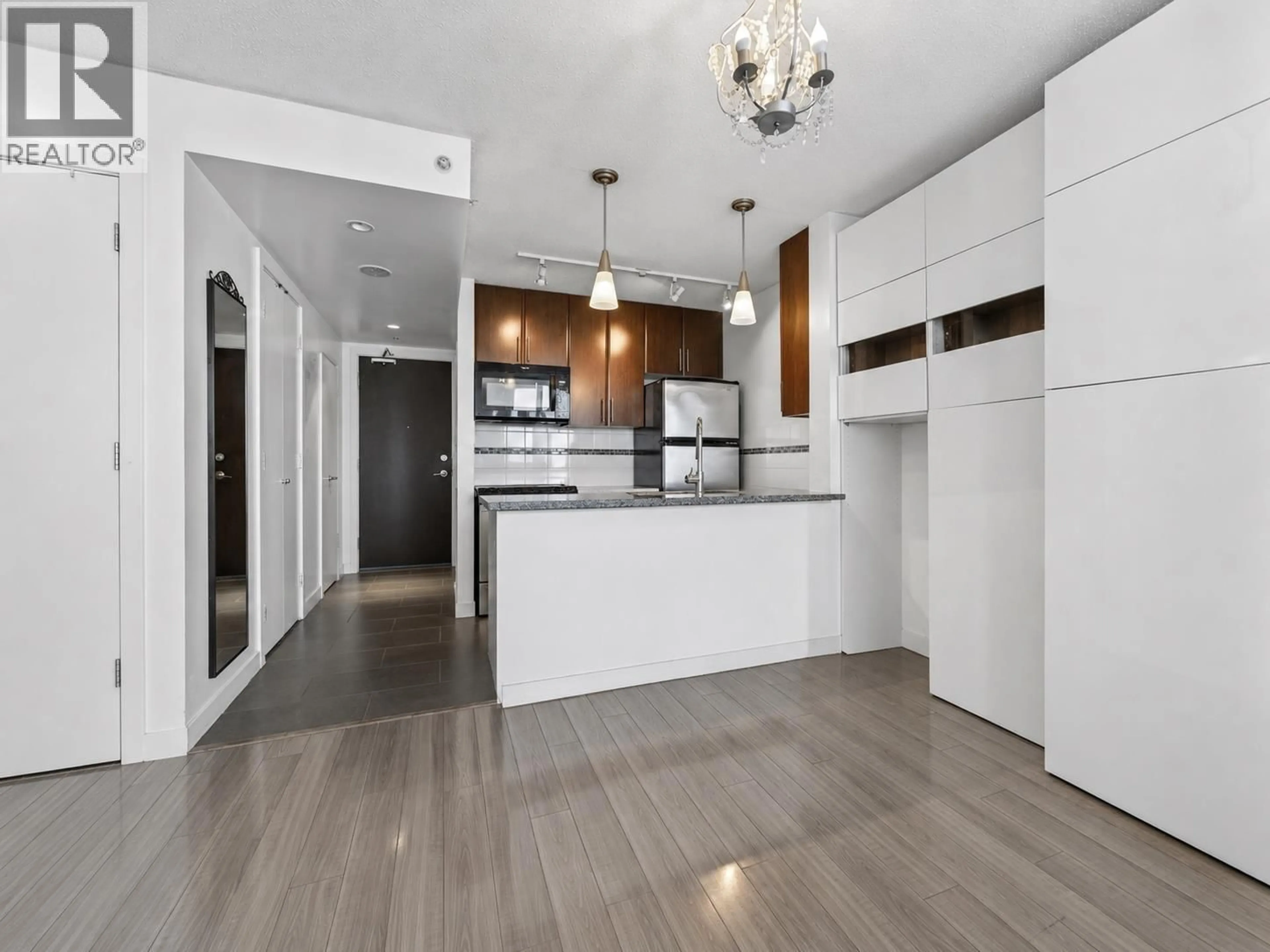 Open concept kitchen, wood/laminate floor for 2309 - 688 ABBOTT STREET, Vancouver British Columbia V6B0B9