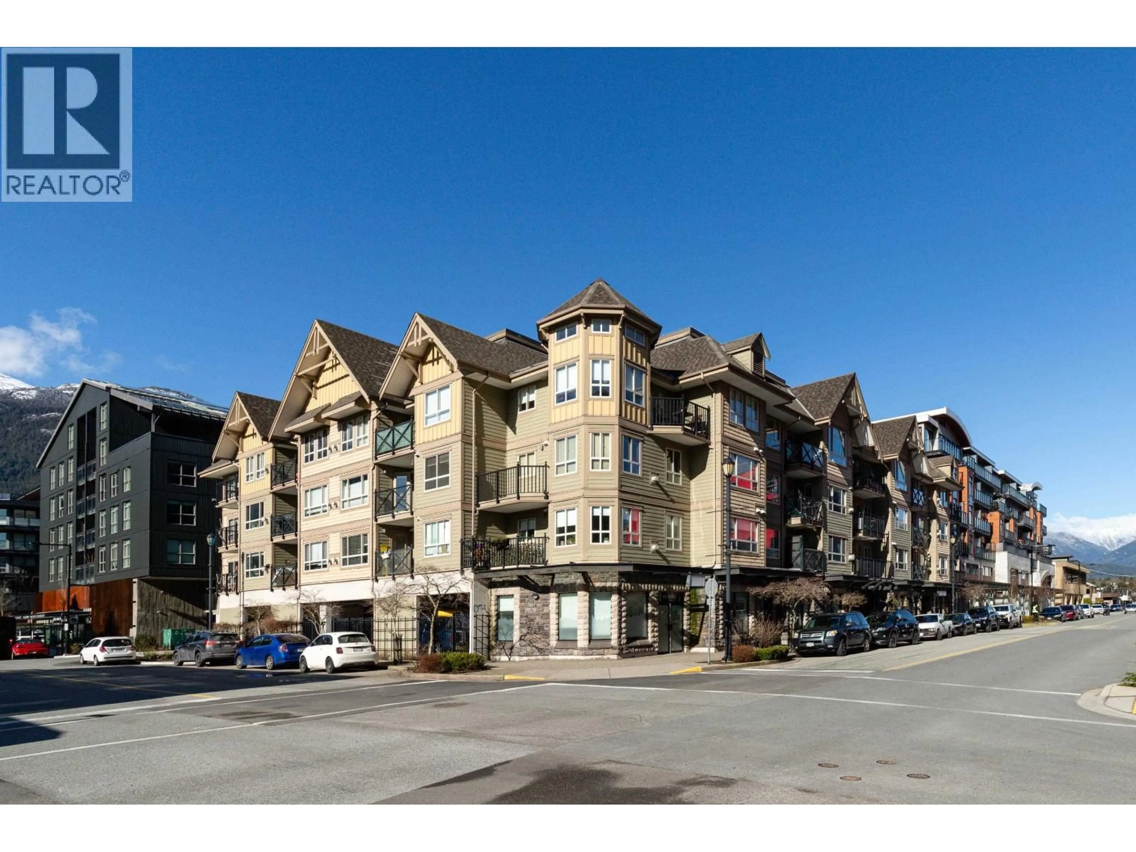 A pic from outside/outdoor area/front of a property/back of a property/a pic from drone, mountain view for 313 - 38003 SECOND AVENUE, Squamish British Columbia V8B0C4