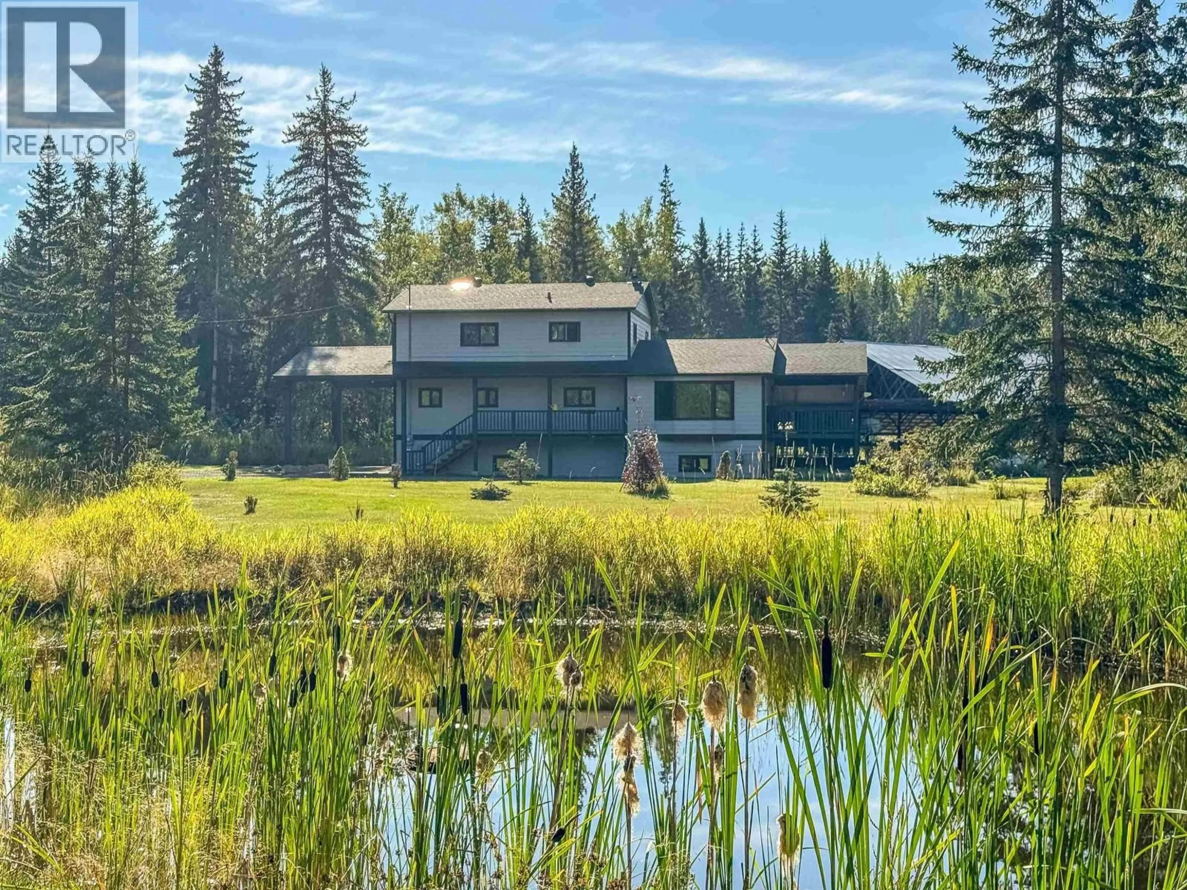 A pic from outside/outdoor area/front of a property/back of a property/a pic from drone, water/lake/river/ocean view for 1705 MILLAR ROAD, Smithers British Columbia V0J2N6