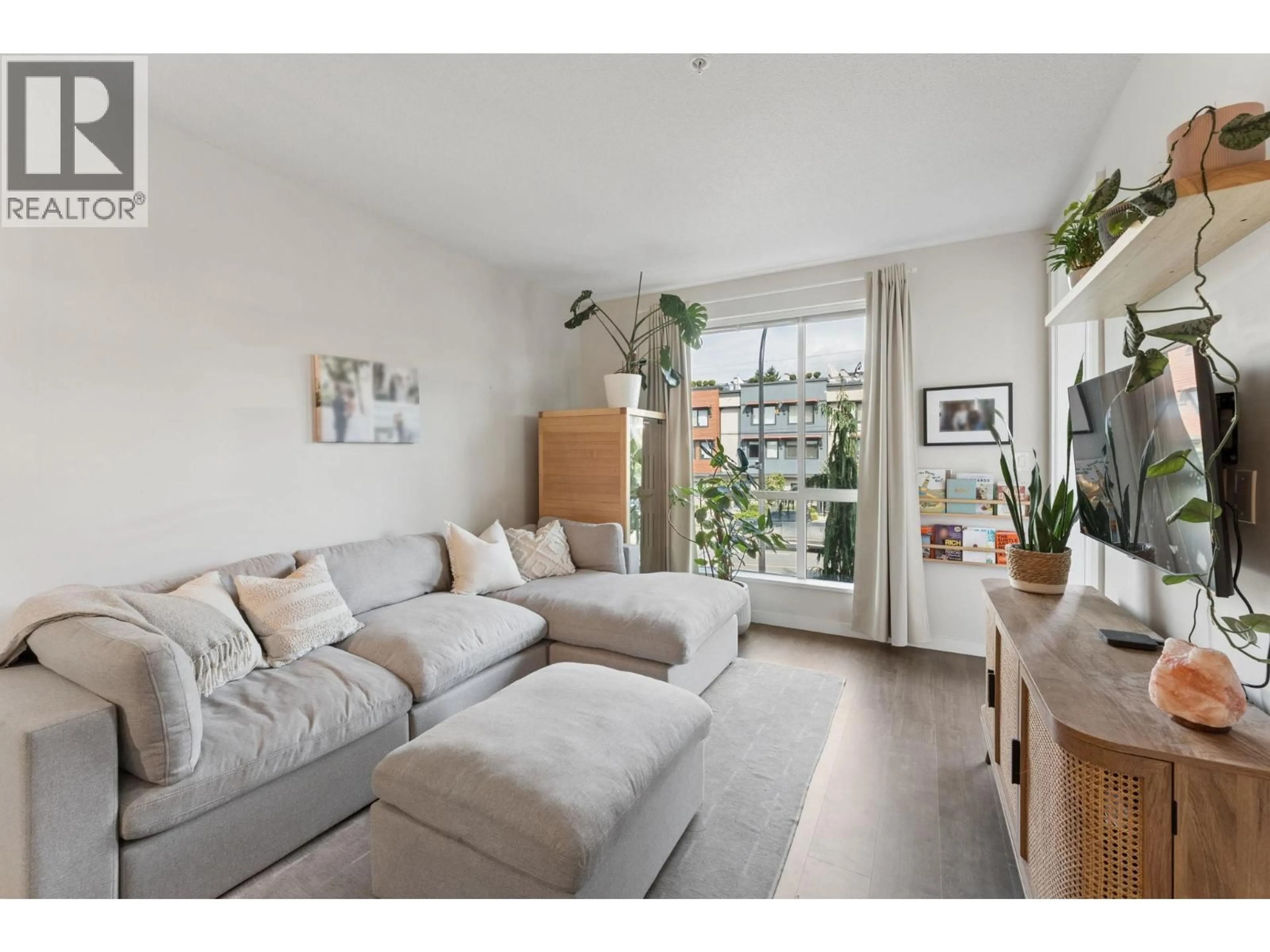 Living room with furniture, unknown for 210 - 625 3RD STREET, North Vancouver British Columbia V7L1G6