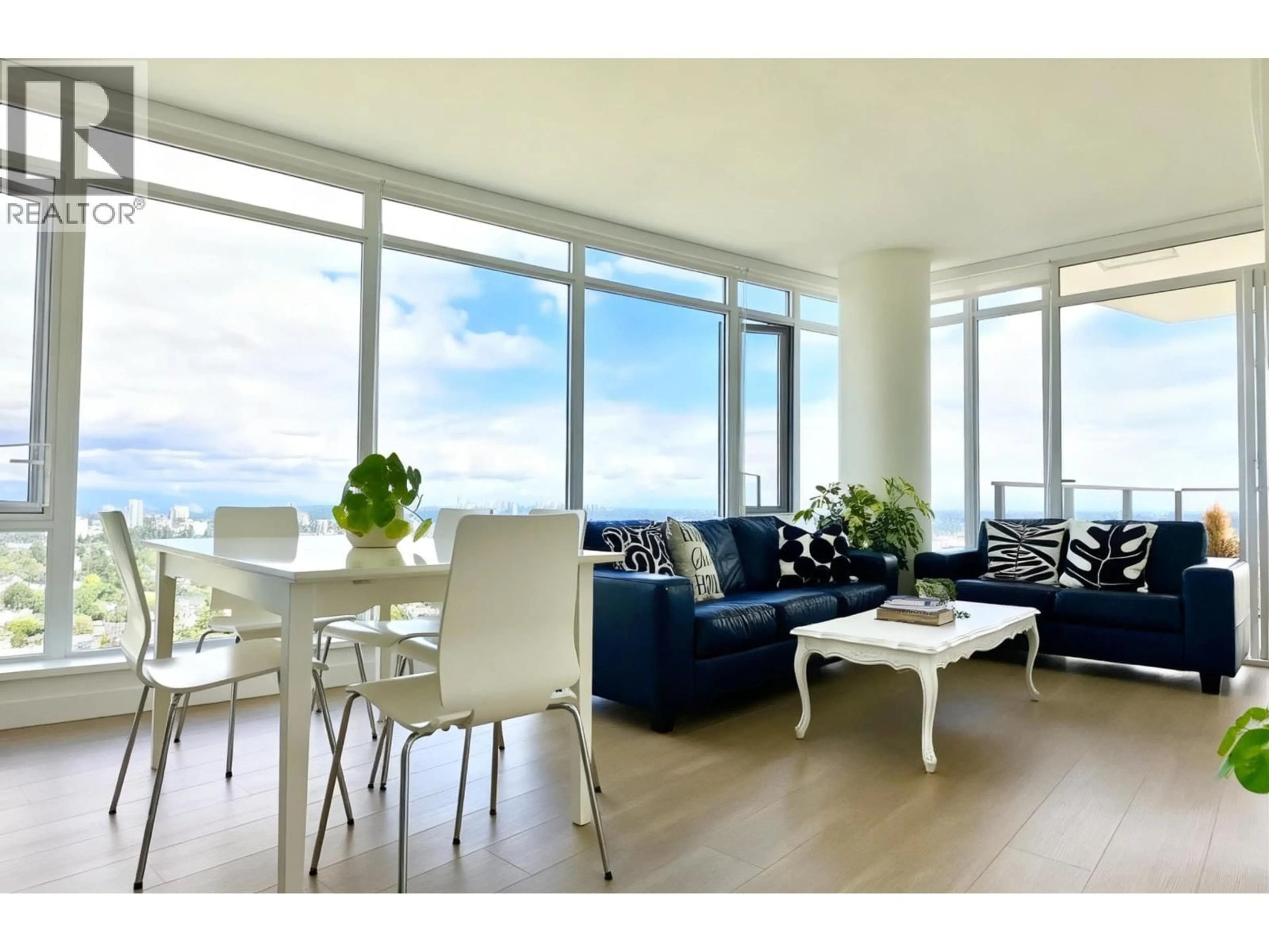 Living room with furniture, wood/laminate floor for 2401 - 7769 PARK CRESCENT, Burnaby British Columbia V3N0J7