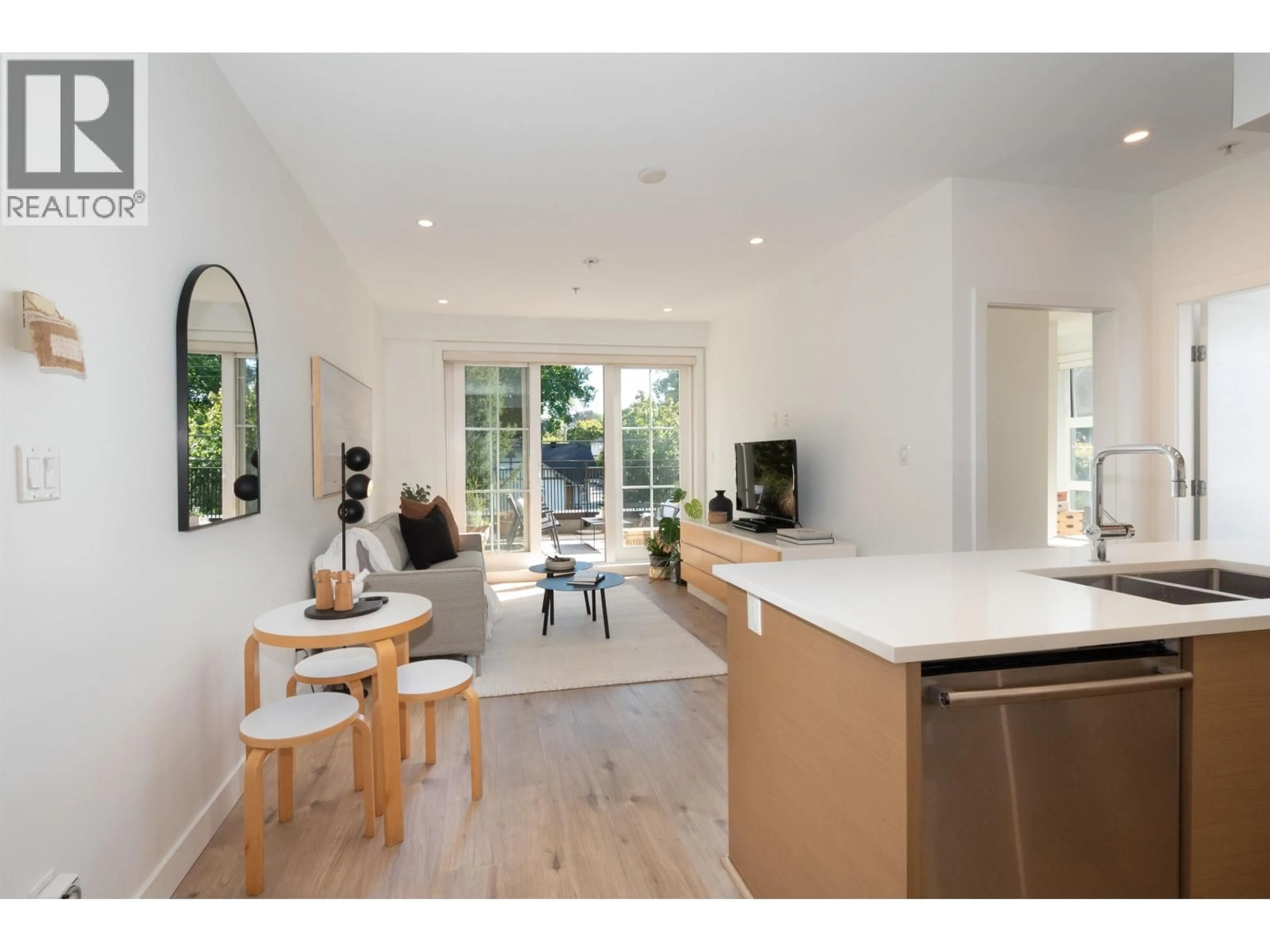 Open concept kitchen, unknown for 203 - 2528 COLLINGWOOD STREET, Vancouver British Columbia V6R0C1