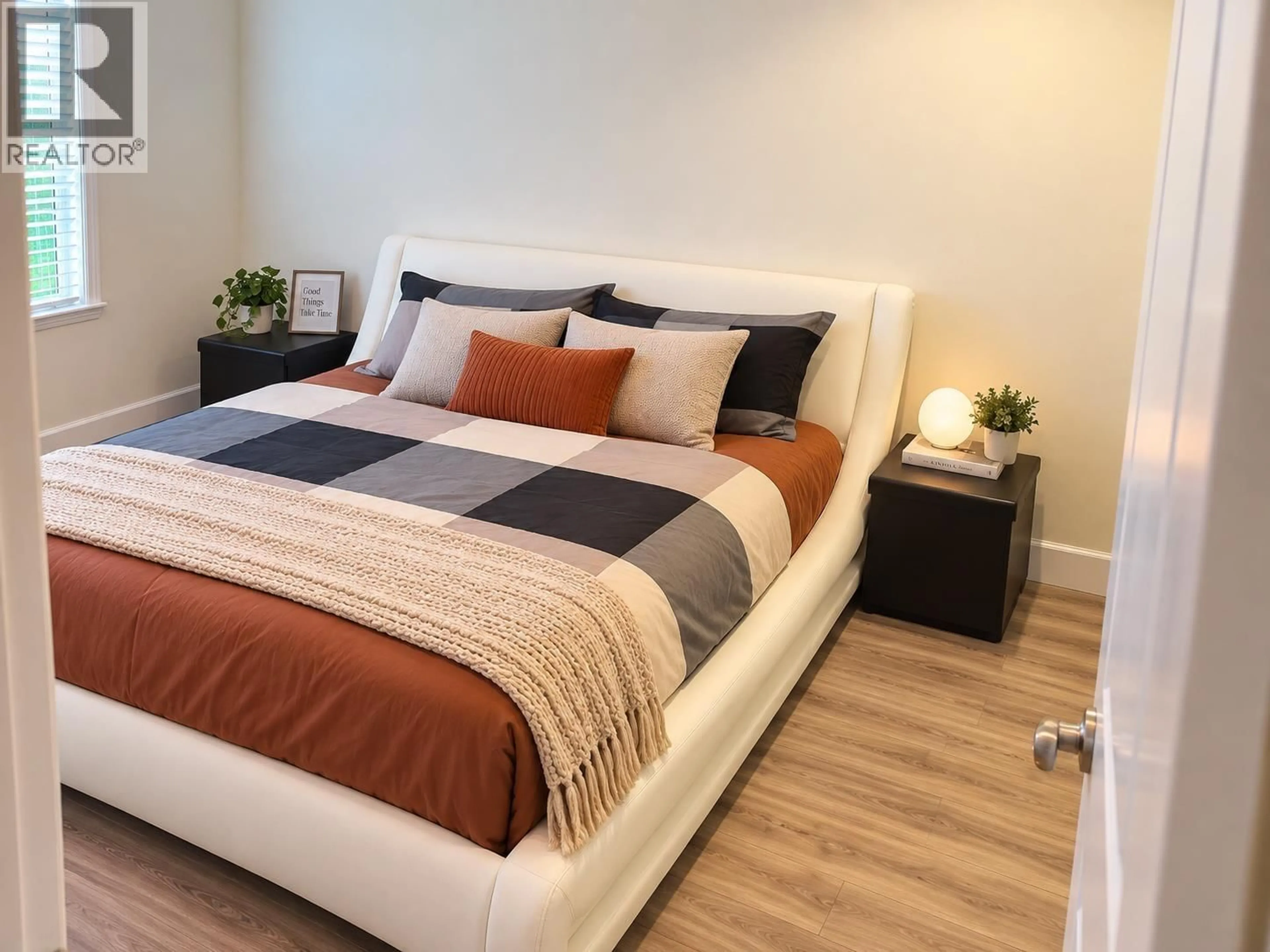 Bedroom with bed, wood/laminate floor for 8221 FREMLIN STREET, Vancouver British Columbia V6P3W9