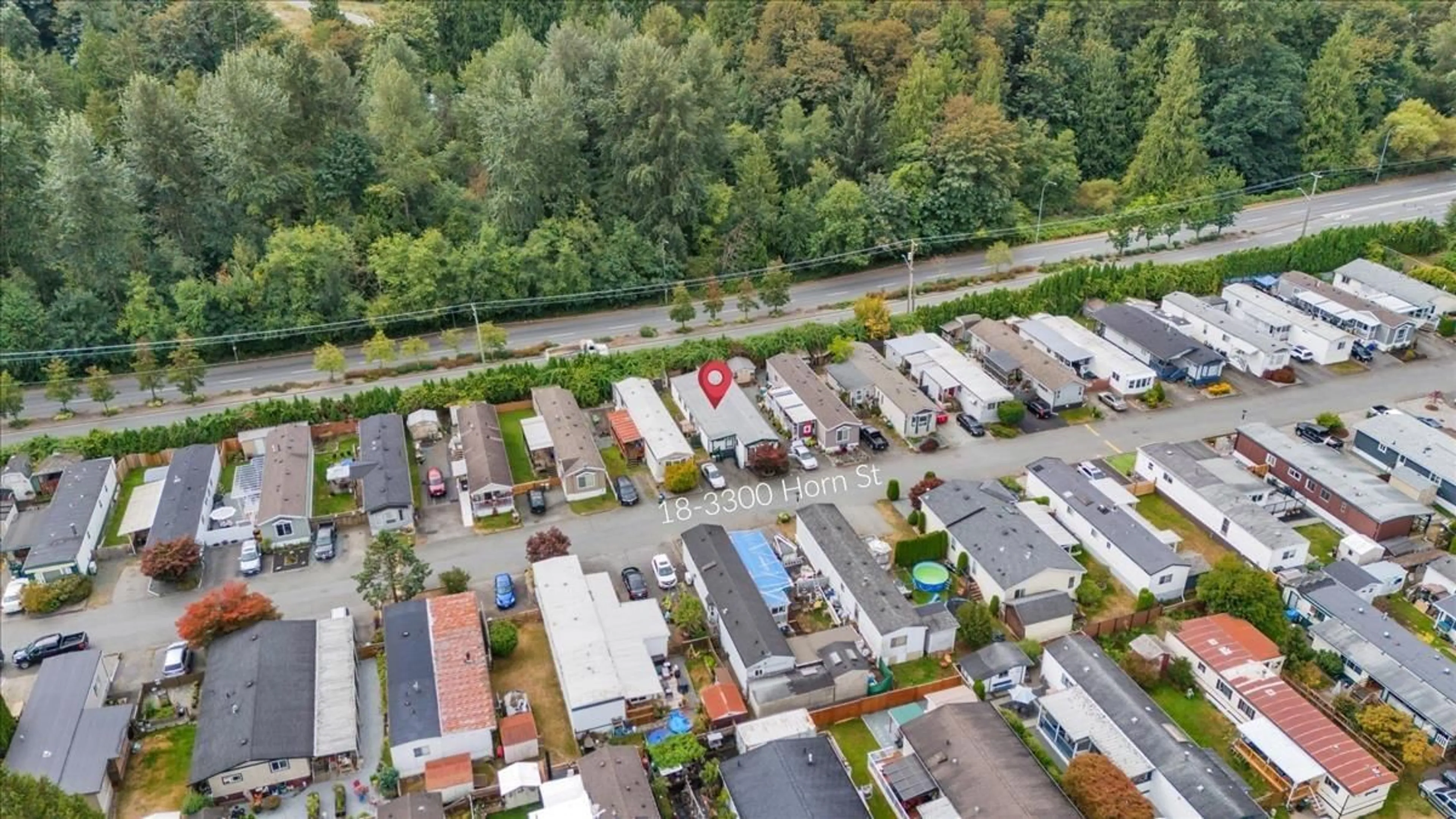 A pic from outside/outdoor area/front of a property/back of a property/a pic from drone, street for 18 - 3300 HORN STREET, Abbotsford British Columbia V2S7Y4