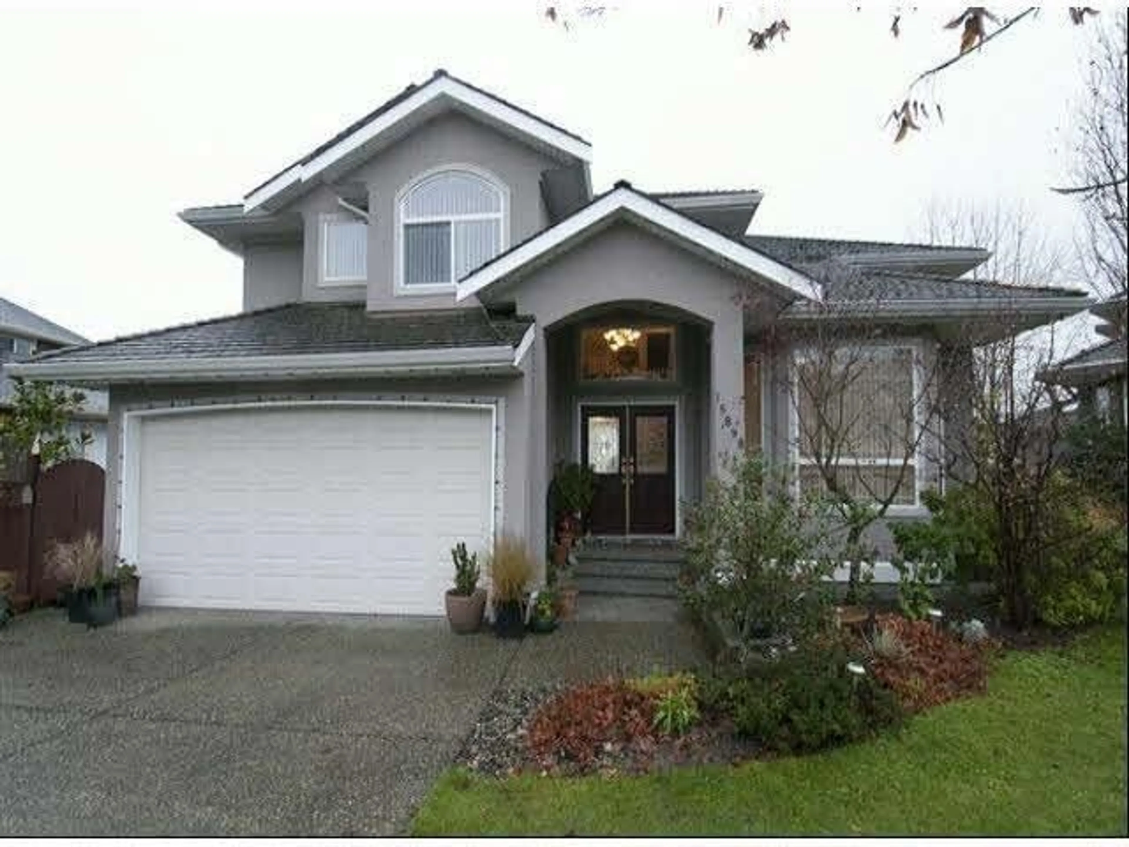 Home with vinyl exterior material, street for 15898 99A AVENUE, Surrey British Columbia V4N2A7