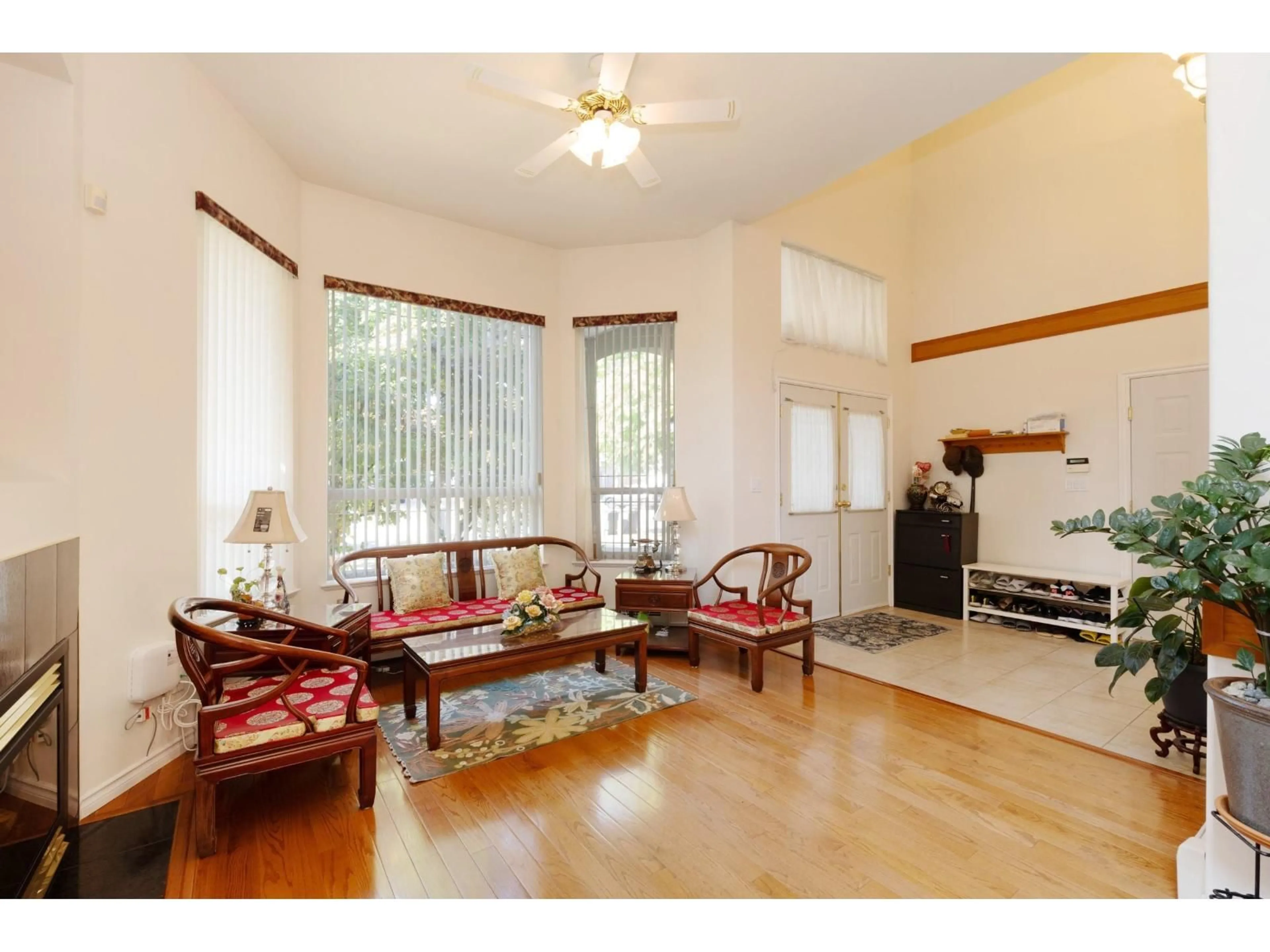 Living room with furniture, wood/laminate floor for 15898 99A AVENUE, Surrey British Columbia V4N2A7