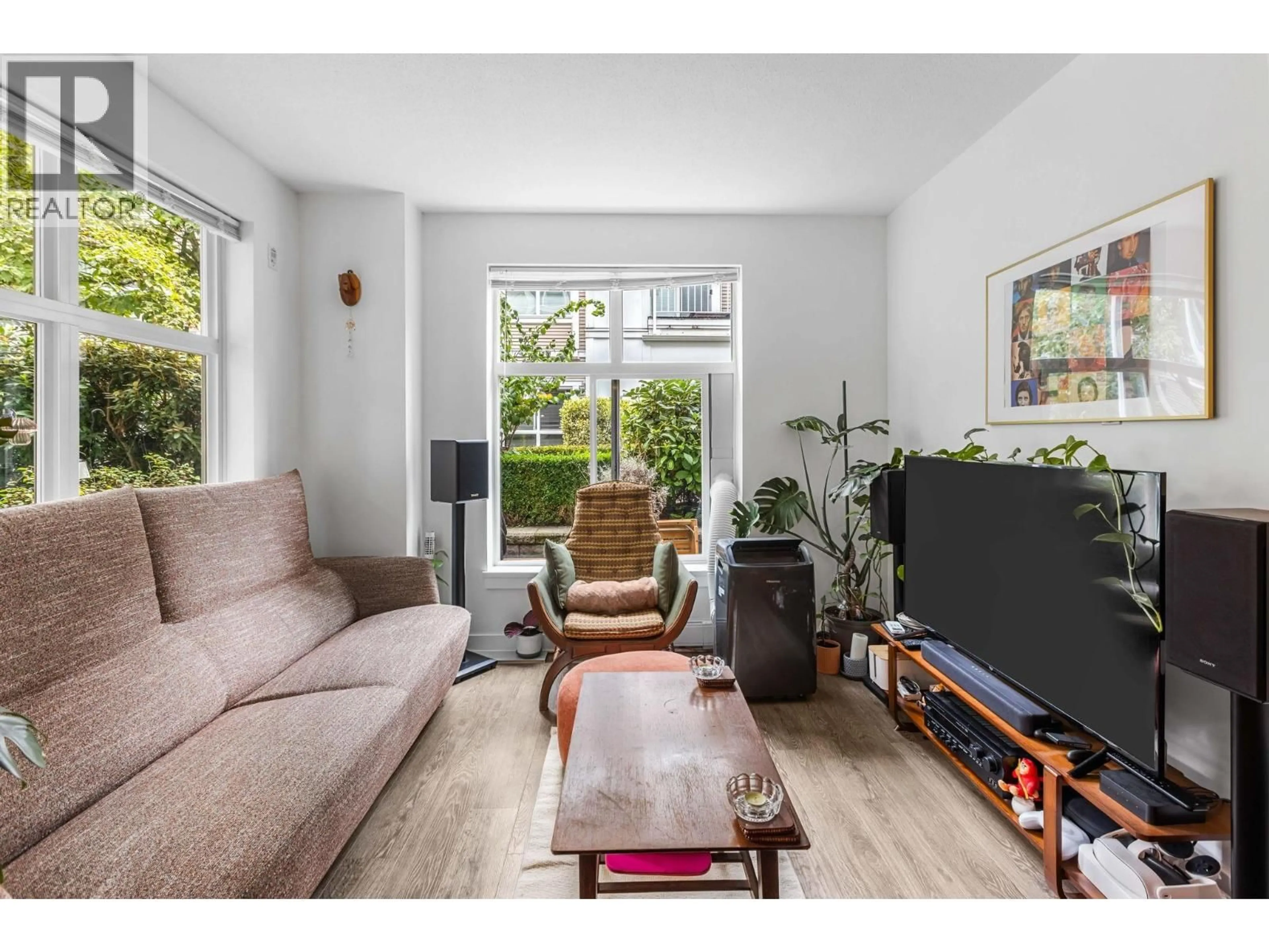 Living room with furniture, wood/laminate floor for 302 - 618 LANGSIDE AVENUE, Coquitlam British Columbia V3J0B8