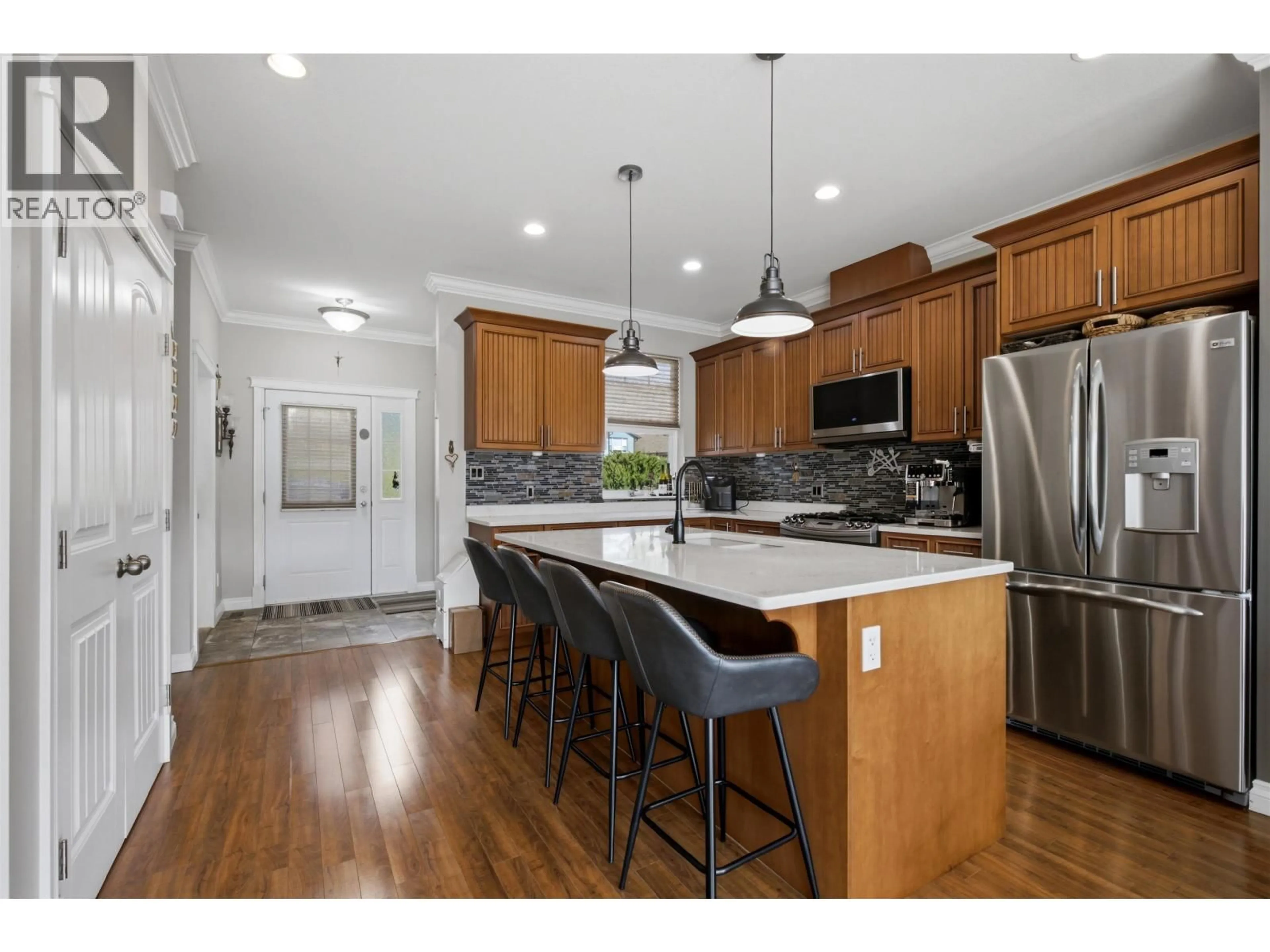Open concept kitchen, wood/laminate floor for 17 - 1880 HAMEL ROAD, Williams Lake British Columbia V2G0A4
