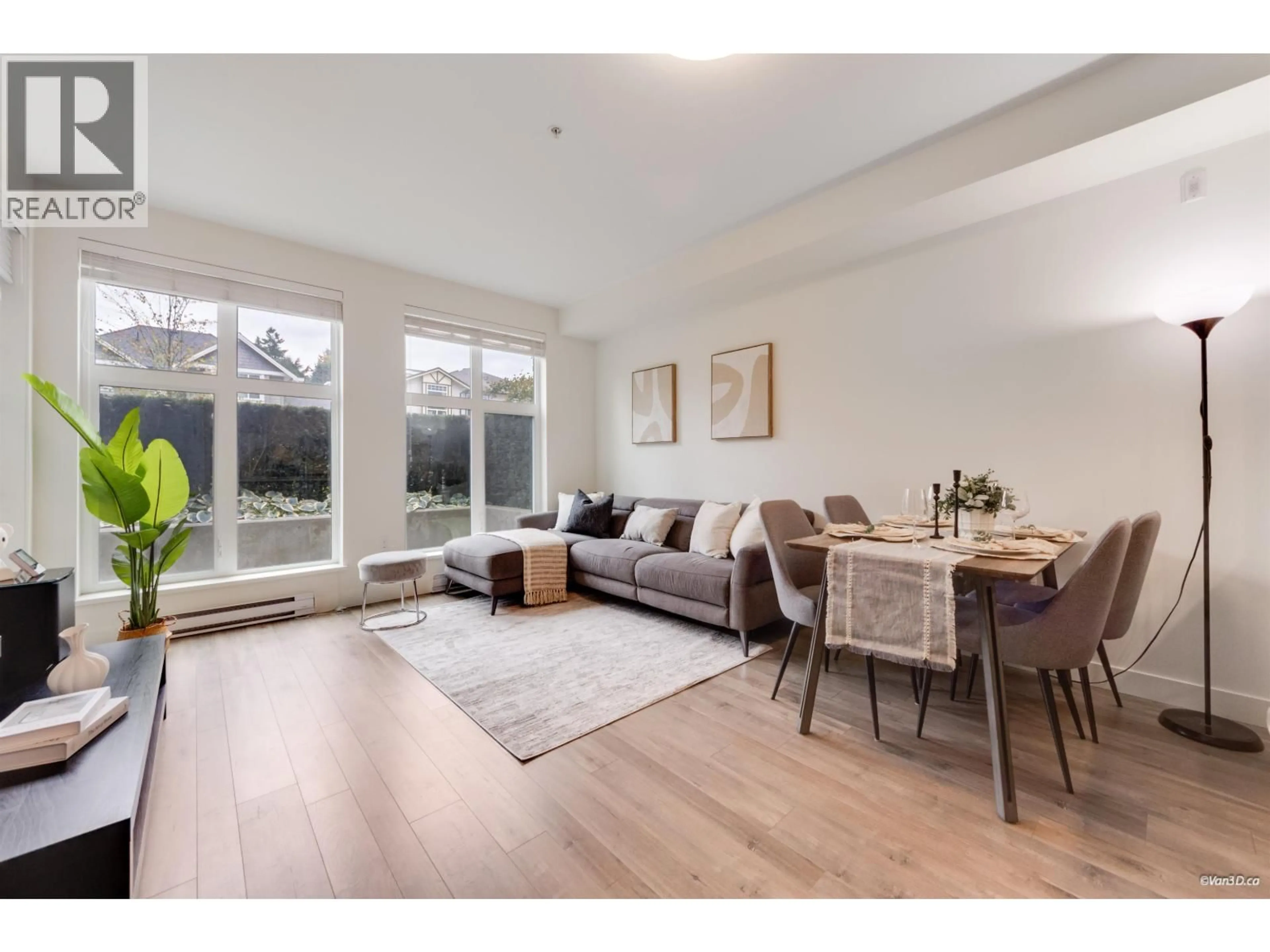 Living room with furniture, wood/laminate floor for 120 750 DOGWOOD STREET, Coquitlam British Columbia V3J0K6