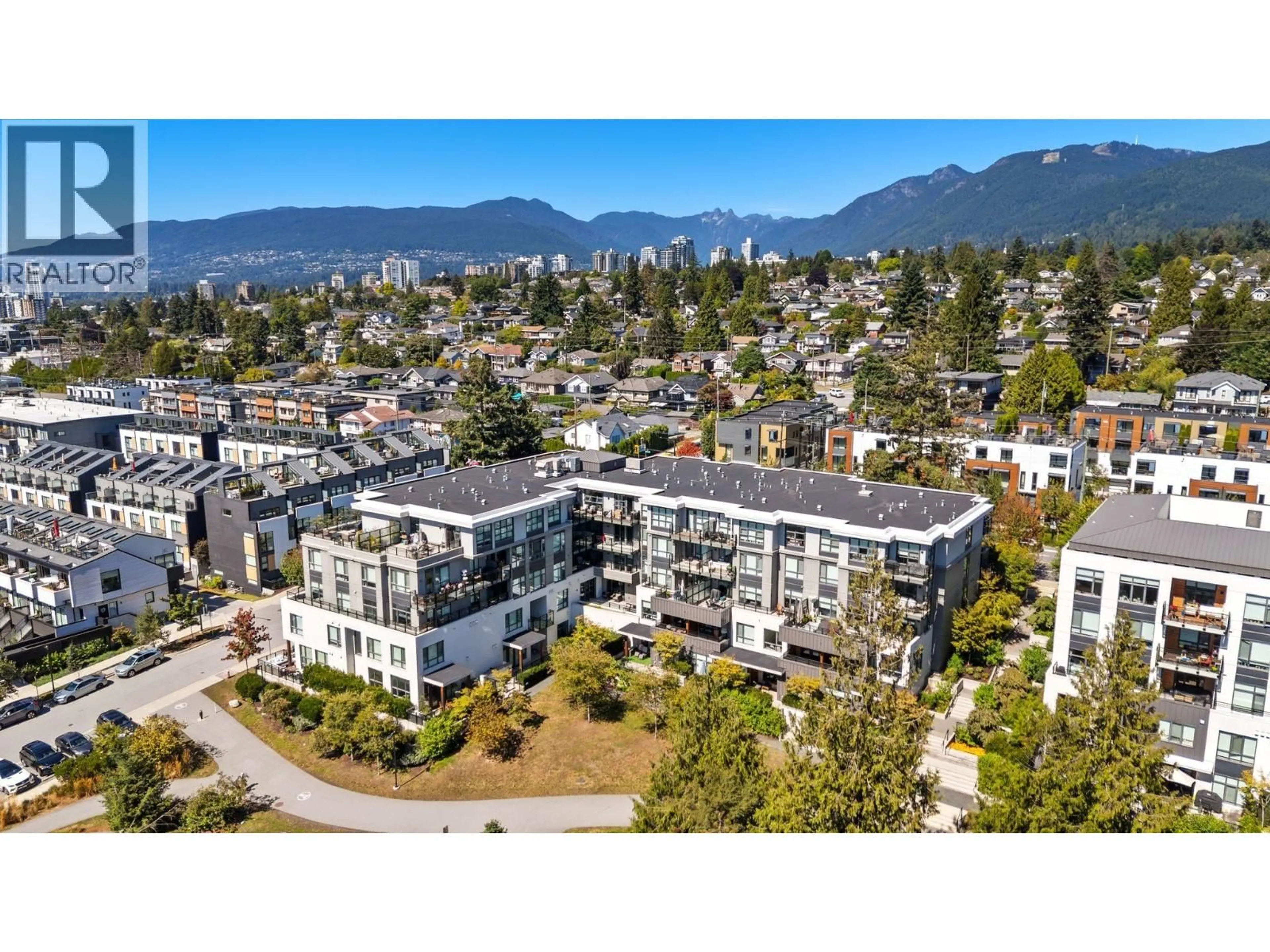 A pic from outside/outdoor area/front of a property/back of a property/a pic from drone, mountain view for 707 3 STREET, North Vancouver British Columbia V7L1G8