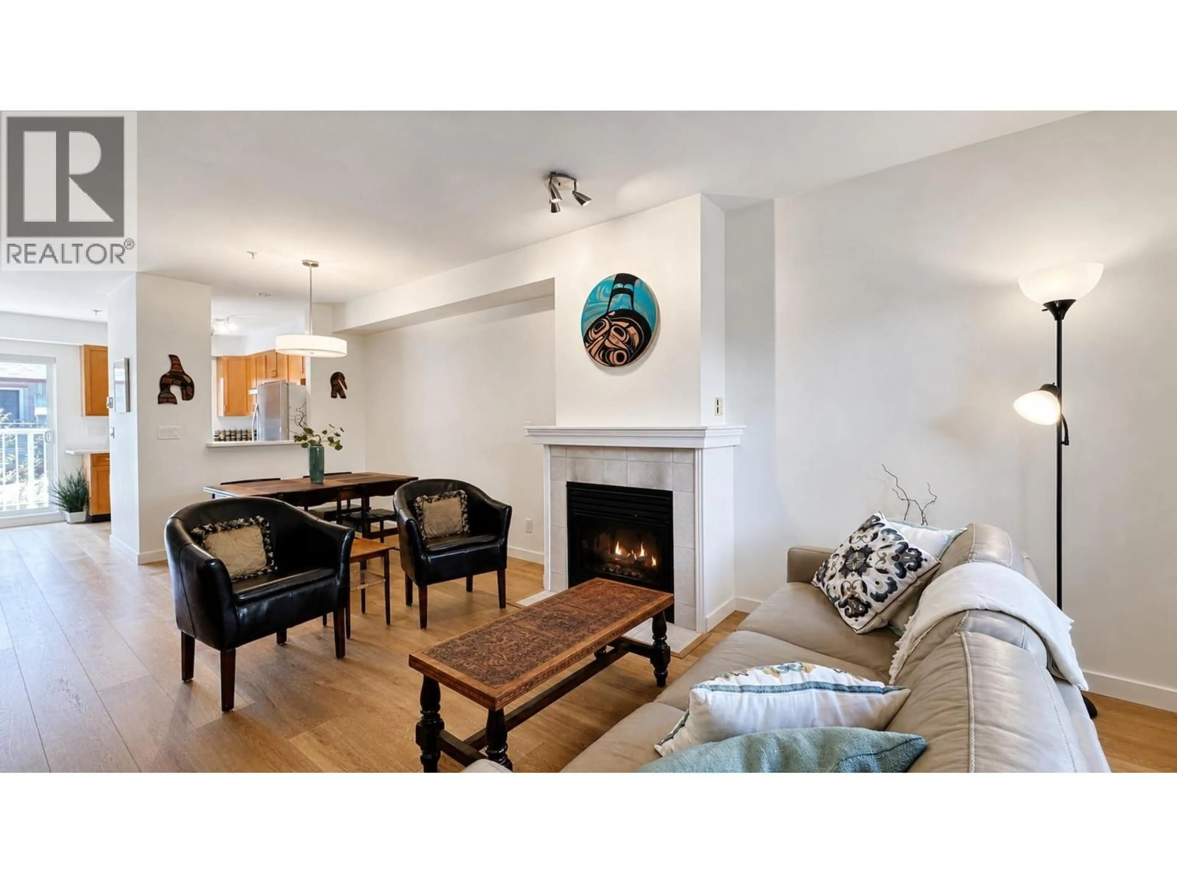 Living room with furniture, wood/laminate floor for 13 - 915 TOBRUCK AVENUE, North Vancouver British Columbia V7P1V9