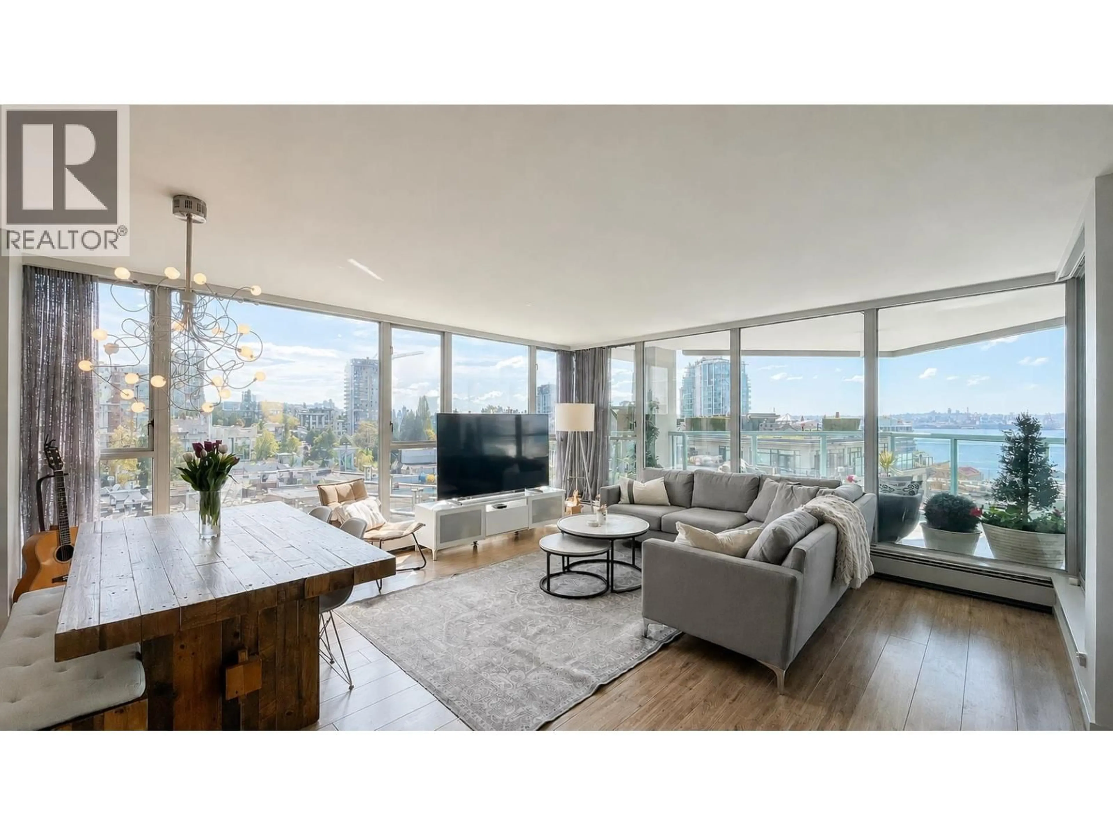 Living room with furniture, wood/laminate floor for 701 - 120 2ND STREET, North Vancouver British Columbia V7M1C3