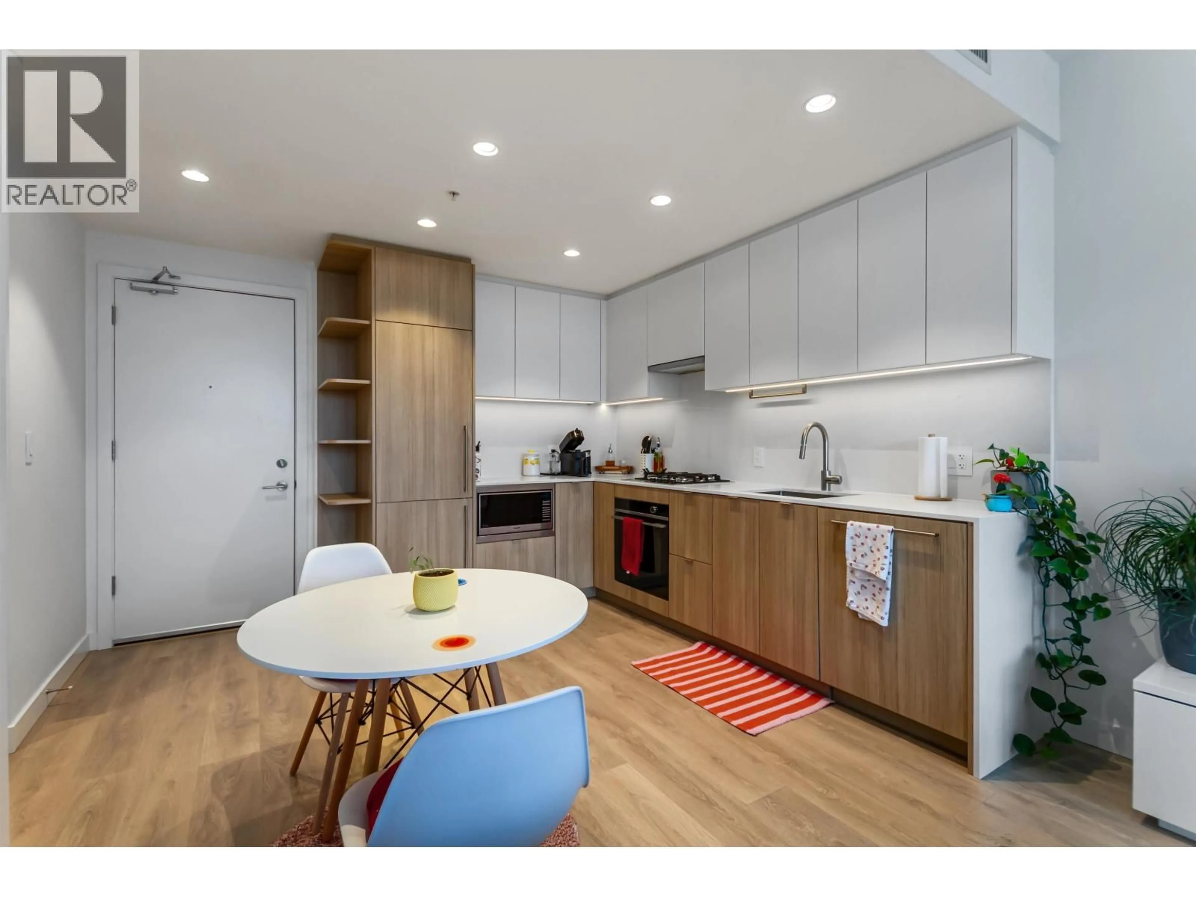 Open concept kitchen, wood/laminate floor for 1707 - 505 NELSON STREET, Coquitlam British Columbia V3J0R5