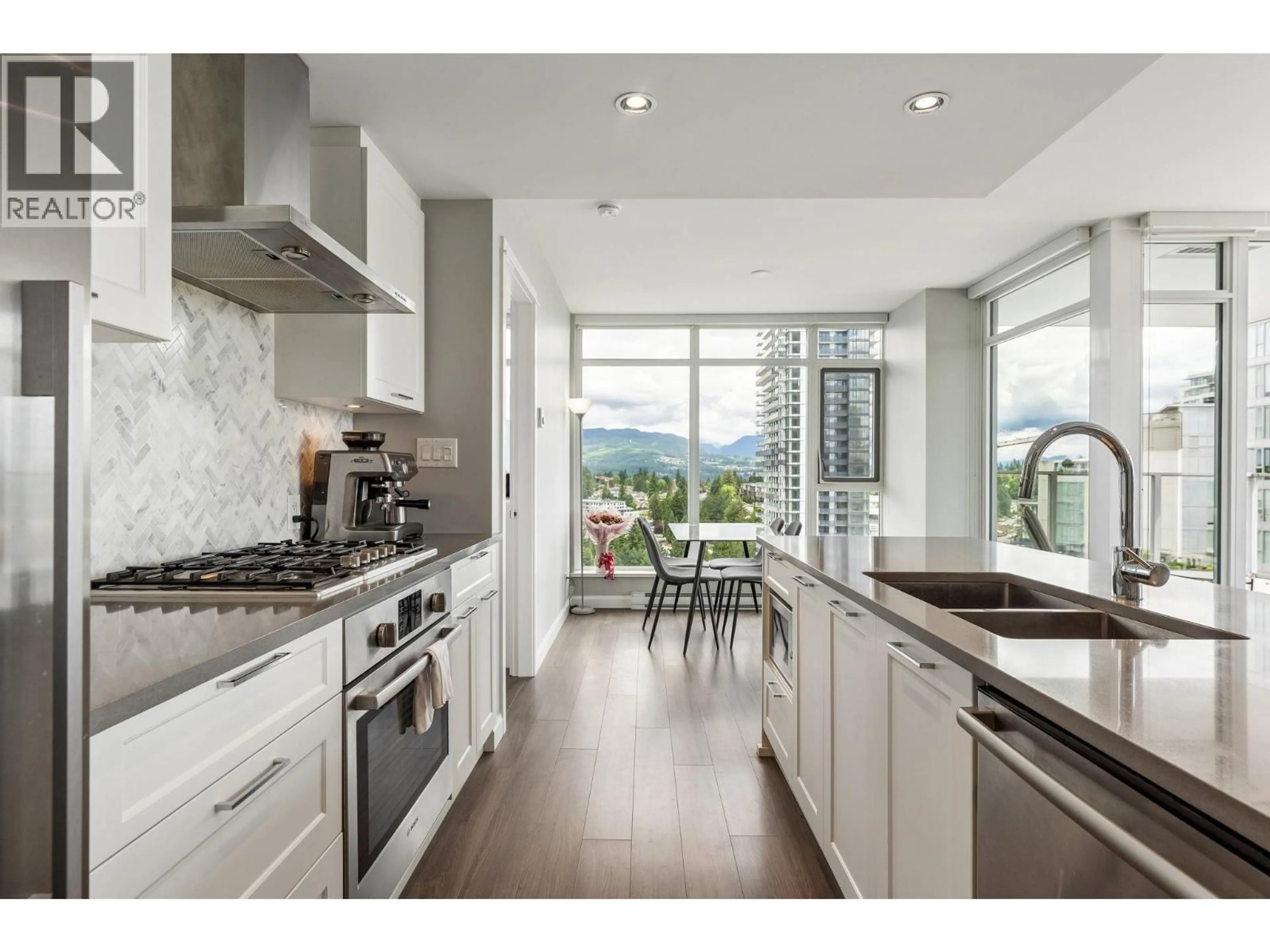 Open concept kitchen, ceramic/tile floor for 2107 - 520 COMO LAKE AVENUE, Coquitlam British Columbia V3J0E8