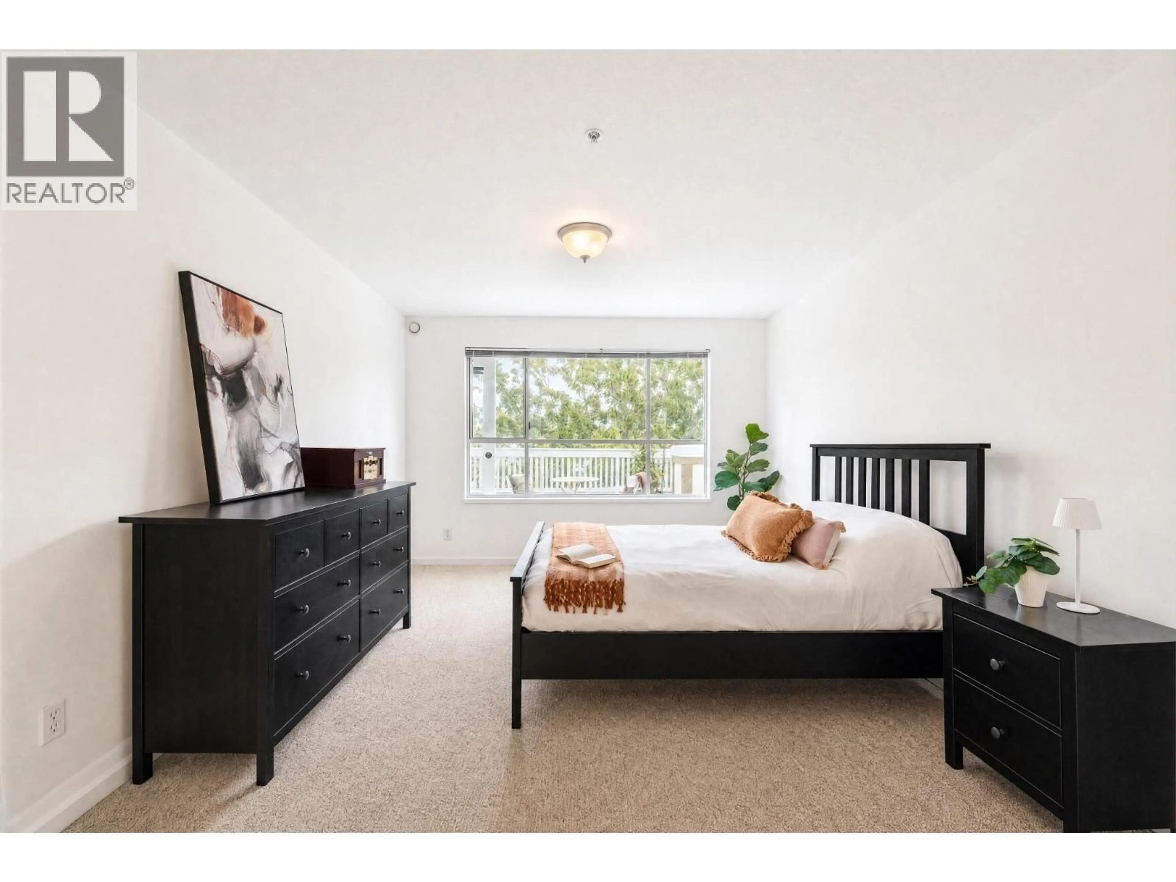 Bedroom with bed, wood/laminate floor for 401 - 8880 JONES ROAD, Richmond British Columbia V6V3Z1