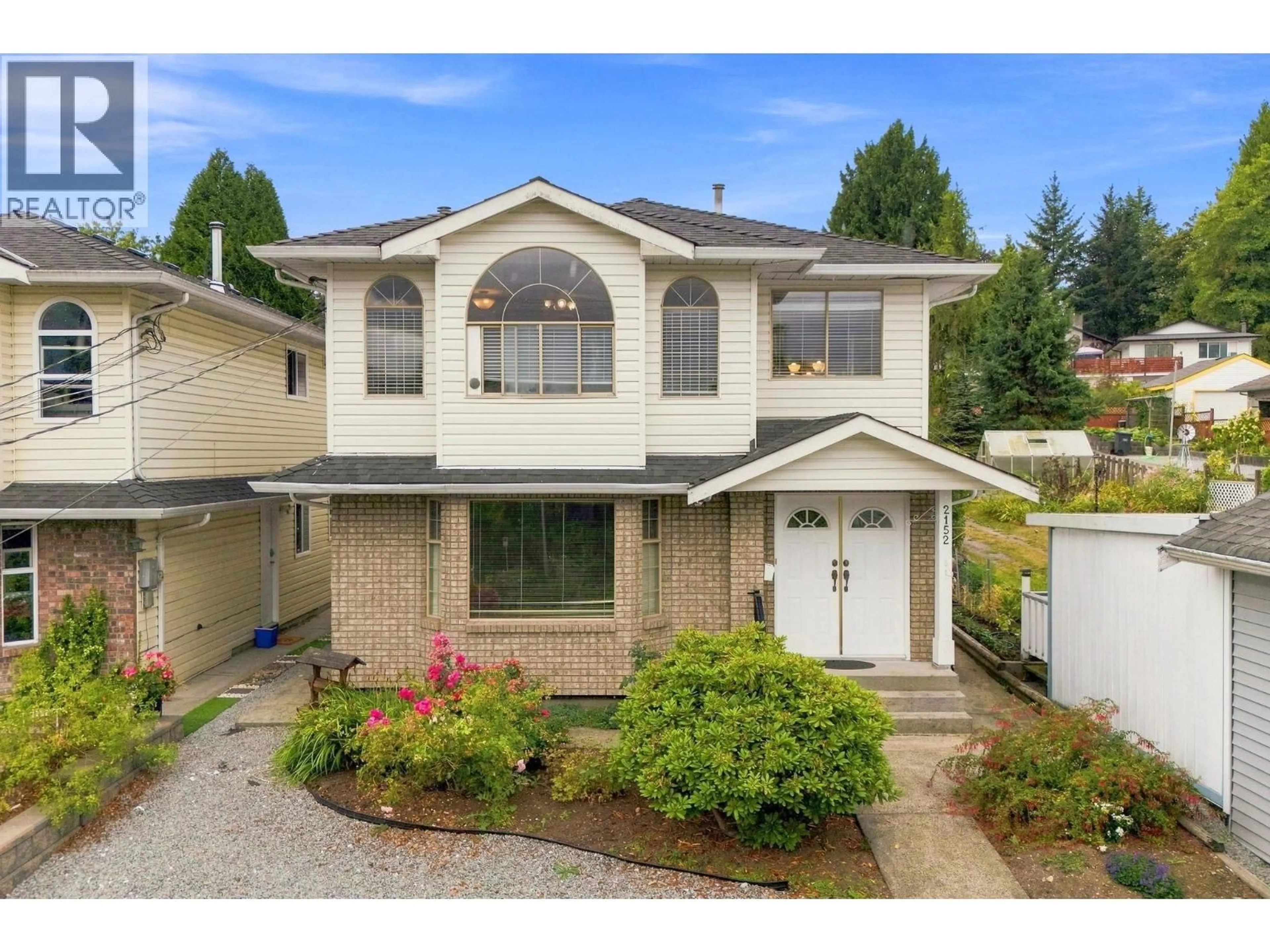 Home with vinyl exterior material, street for 2152 PITT RIVER ROAD, Port Coquitlam British Columbia V3C1R4