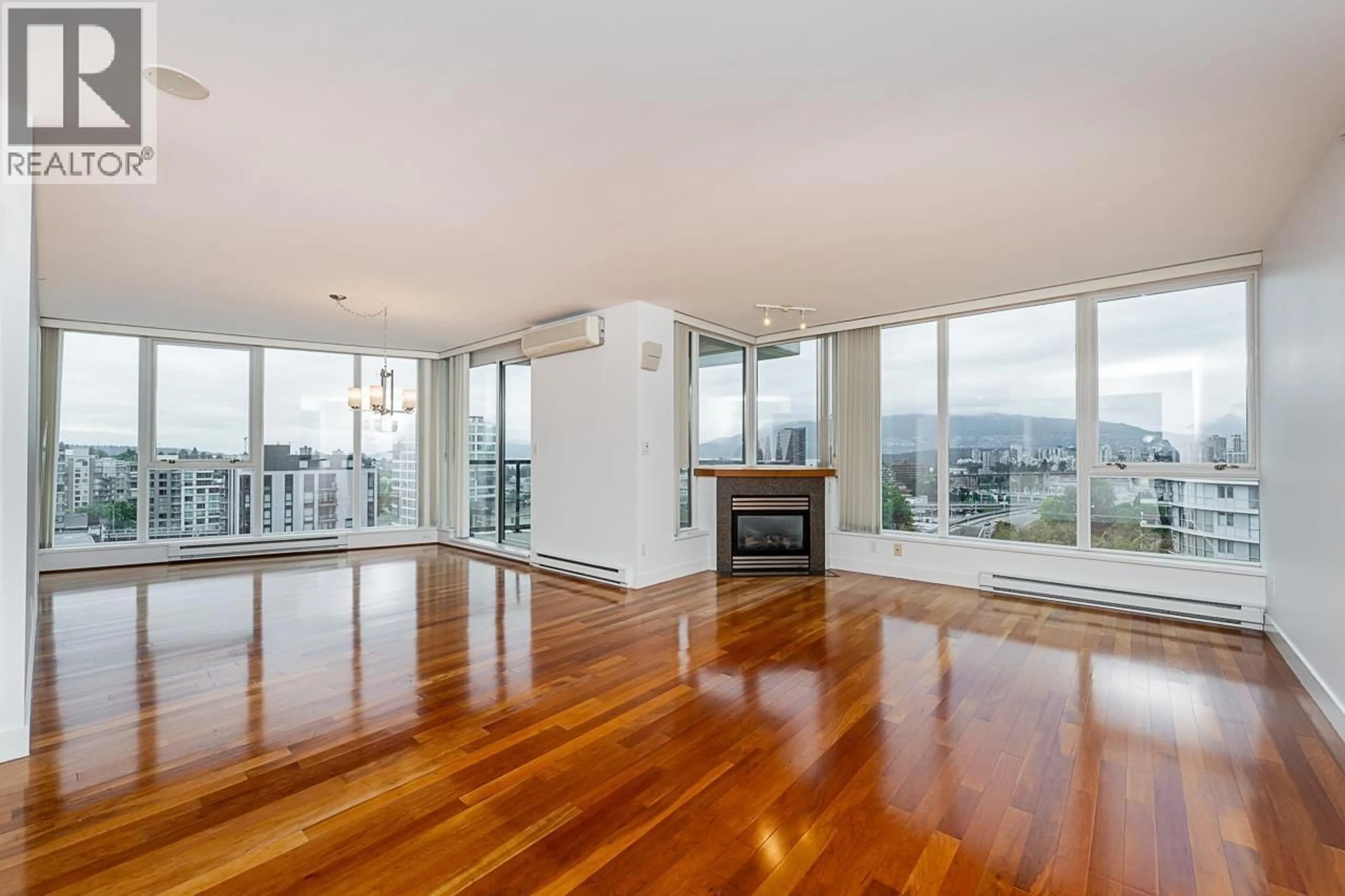 Living room with furniture, wood/laminate floor for 1004 - 1483 7TH AVENUE, Vancouver British Columbia V6H4H6
