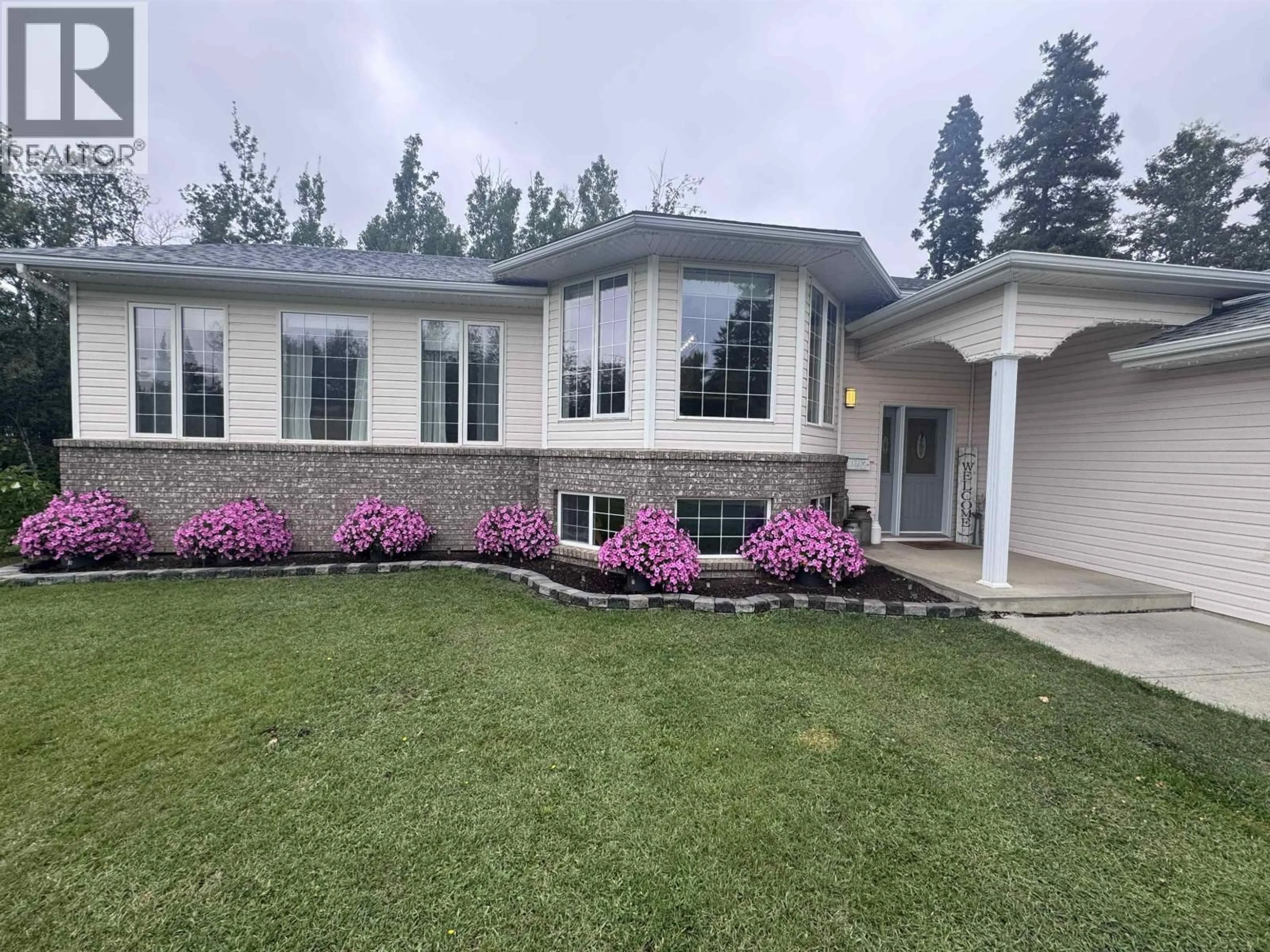 Home with vinyl exterior material, unknown for 12236 242 ROAD, Fort St. John British Columbia V1J8A9