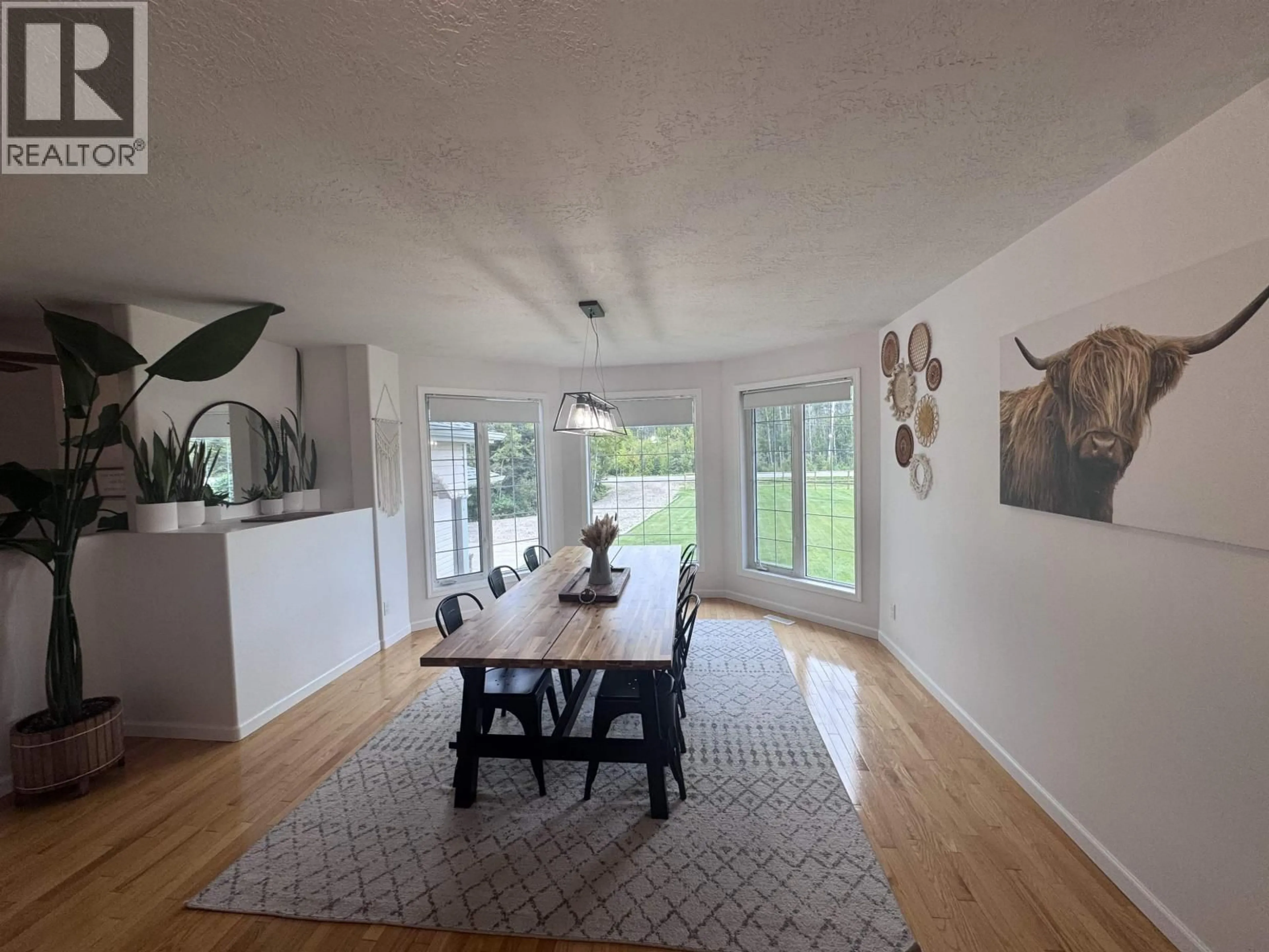 Dining room, wood/laminate floor for 12236 242 ROAD, Fort St. John British Columbia V1J8A9