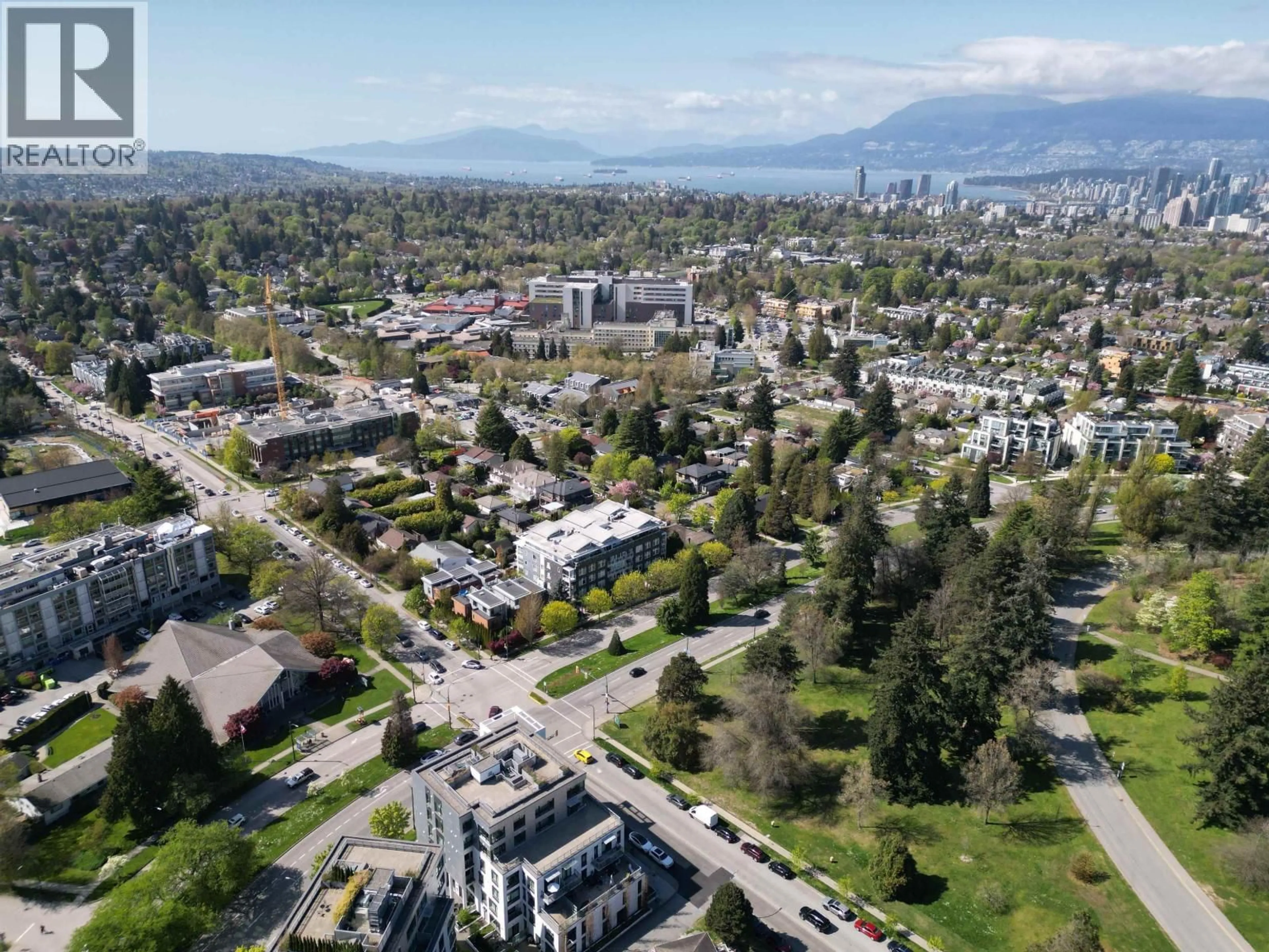 A pic from outside/outdoor area/front of a property/back of a property/a pic from drone, mountain view for 509 - 4867 CAMBIE STREET, Vancouver British Columbia V5Z0C5