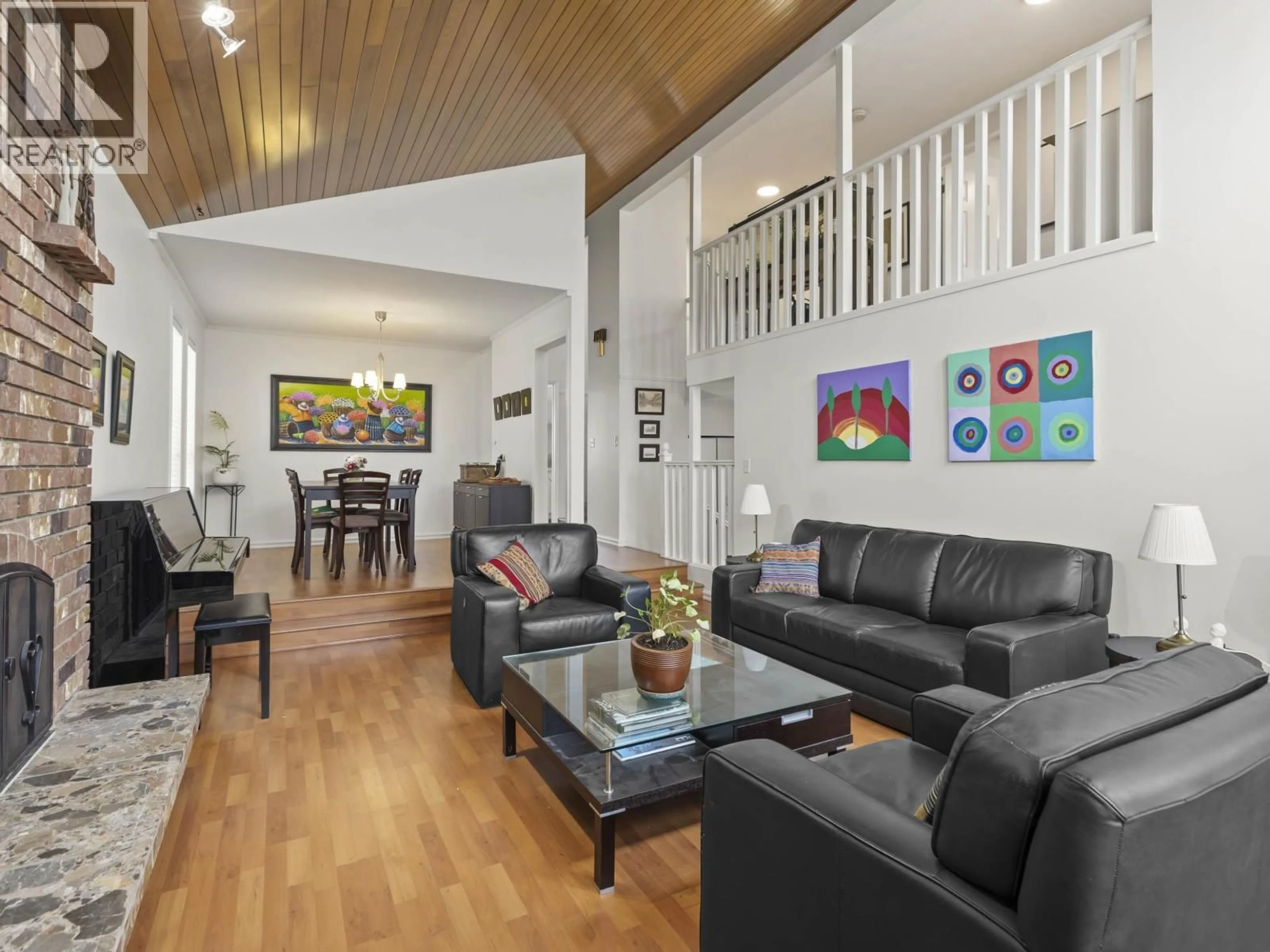 Living room with furniture, wood/laminate floor for 5120 HOLLYFIELD AVENUE, Richmond British Columbia V7E4T8
