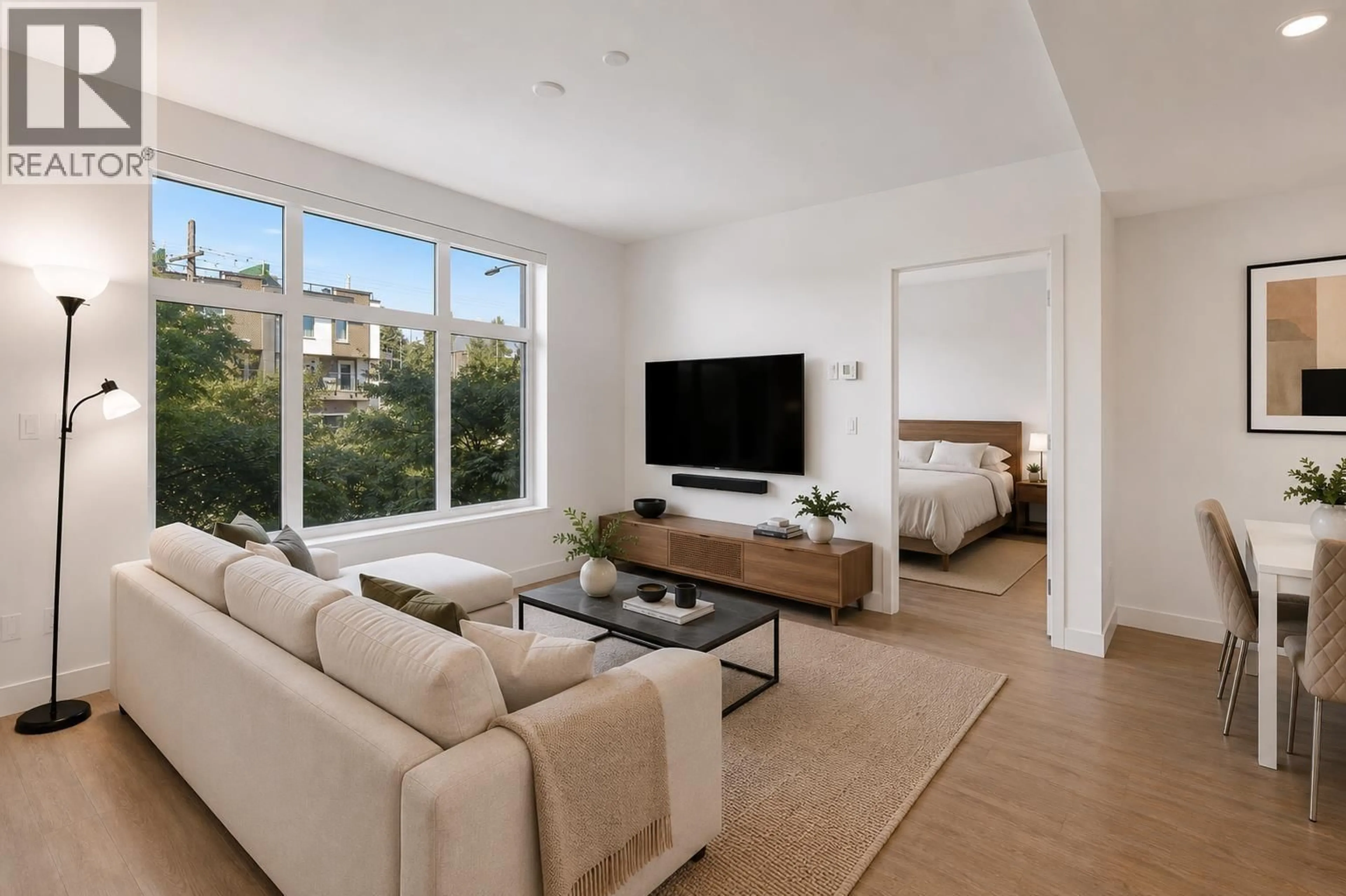 Living room with furniture, unknown for 203 - 747 3RD STREET, North Vancouver British Columbia V7L1G8