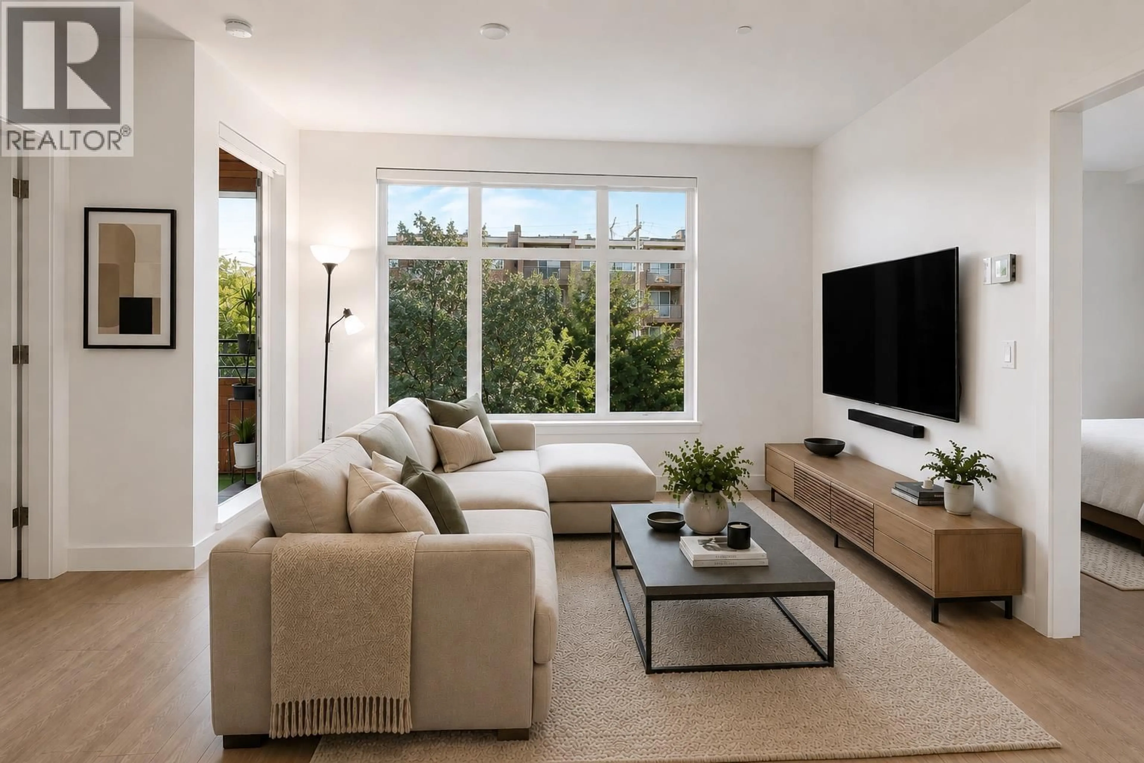 Living room with furniture, unknown for 203 - 747 3RD STREET, North Vancouver British Columbia V7L1G8