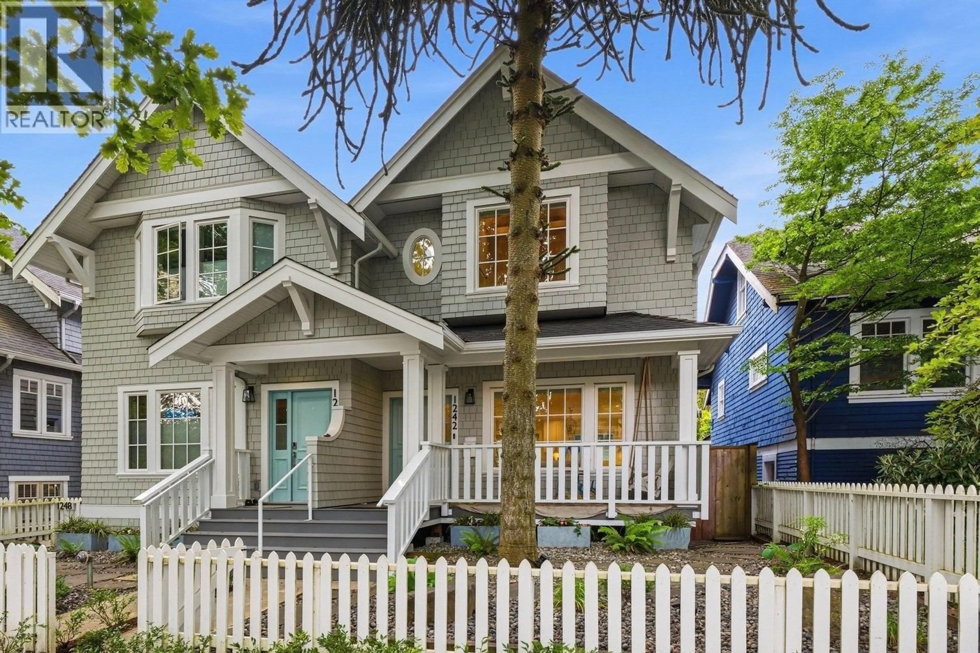Home with vinyl exterior material, street for 1242 23RD AVENUE, Vancouver British Columbia V5V1Y9