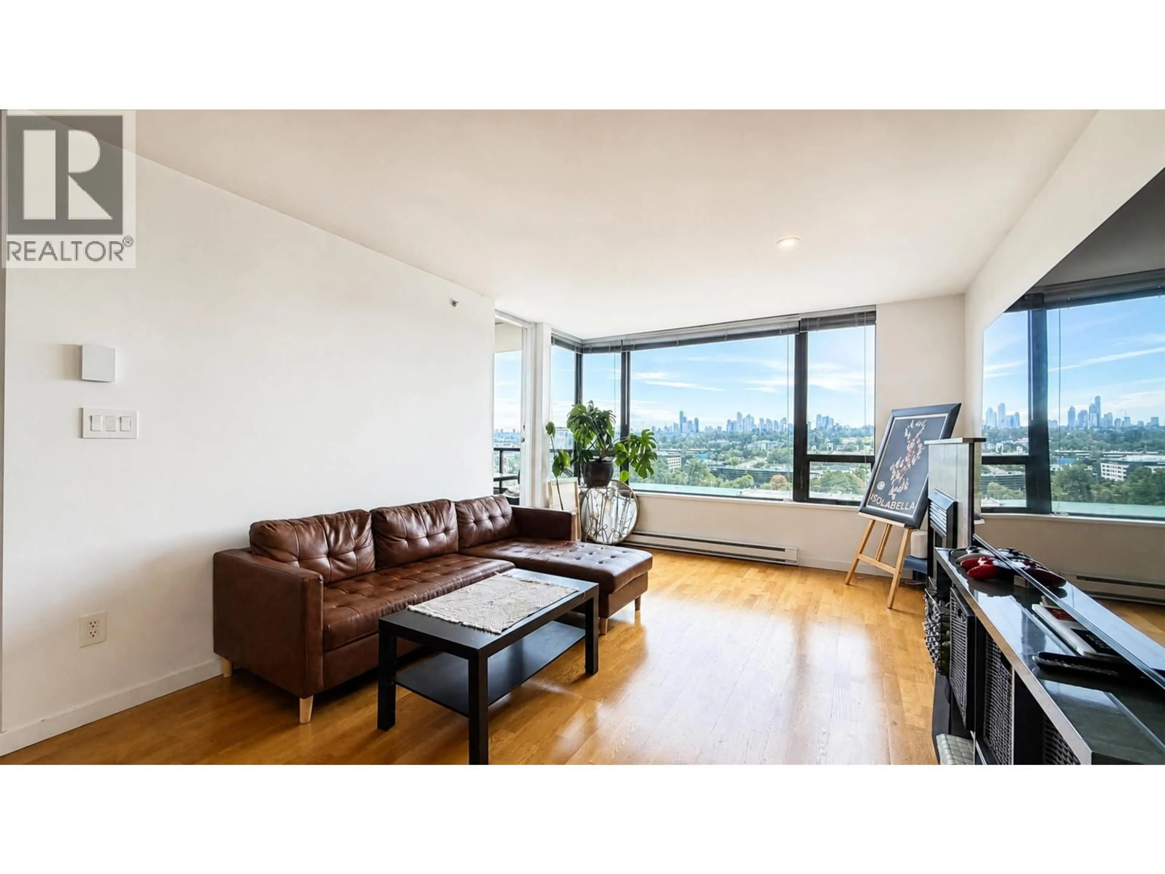 Living room with furniture, wood/laminate floor for 1607 - 4118 DAWSON STREET, Burnaby British Columbia V5Y0L7