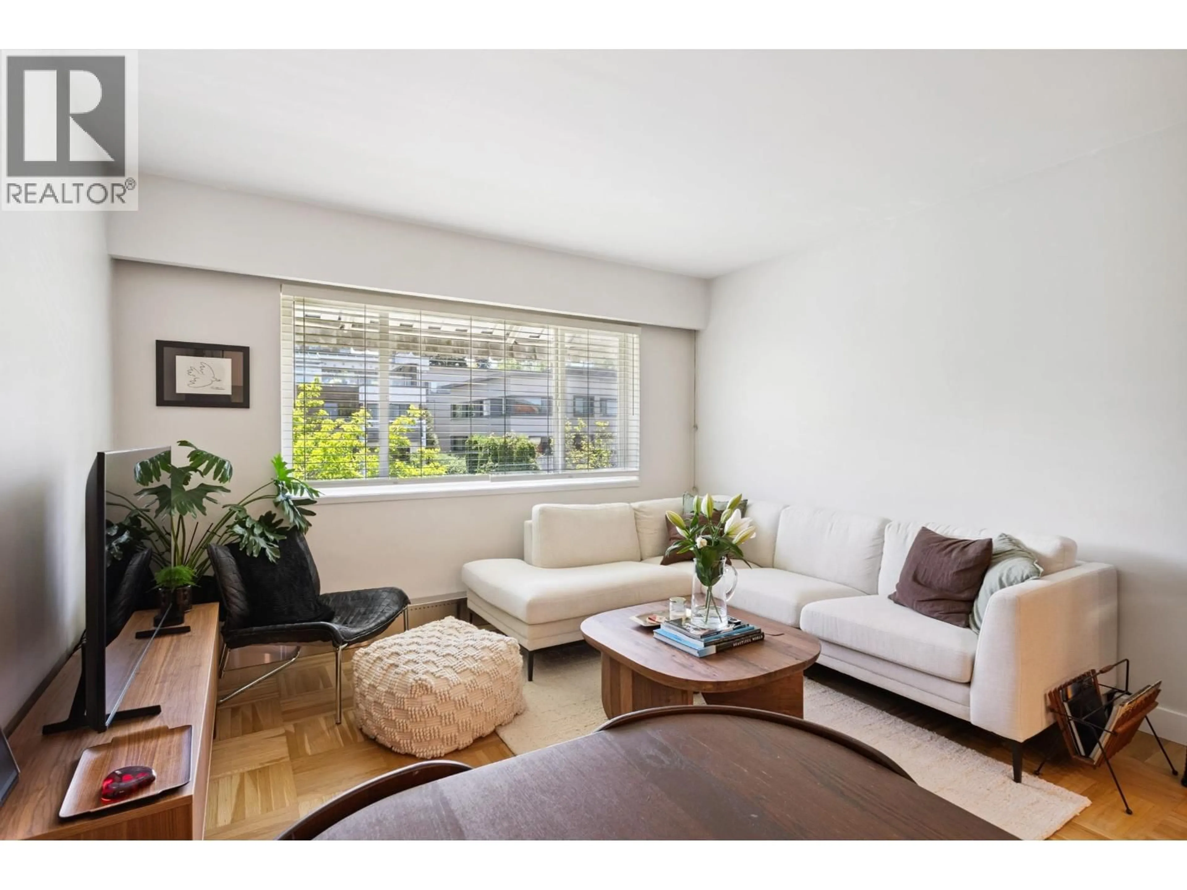 Living room with furniture, wood/laminate floor for 303 - 2469 CORNWALL AVENUE, Vancouver British Columbia V6K1B9