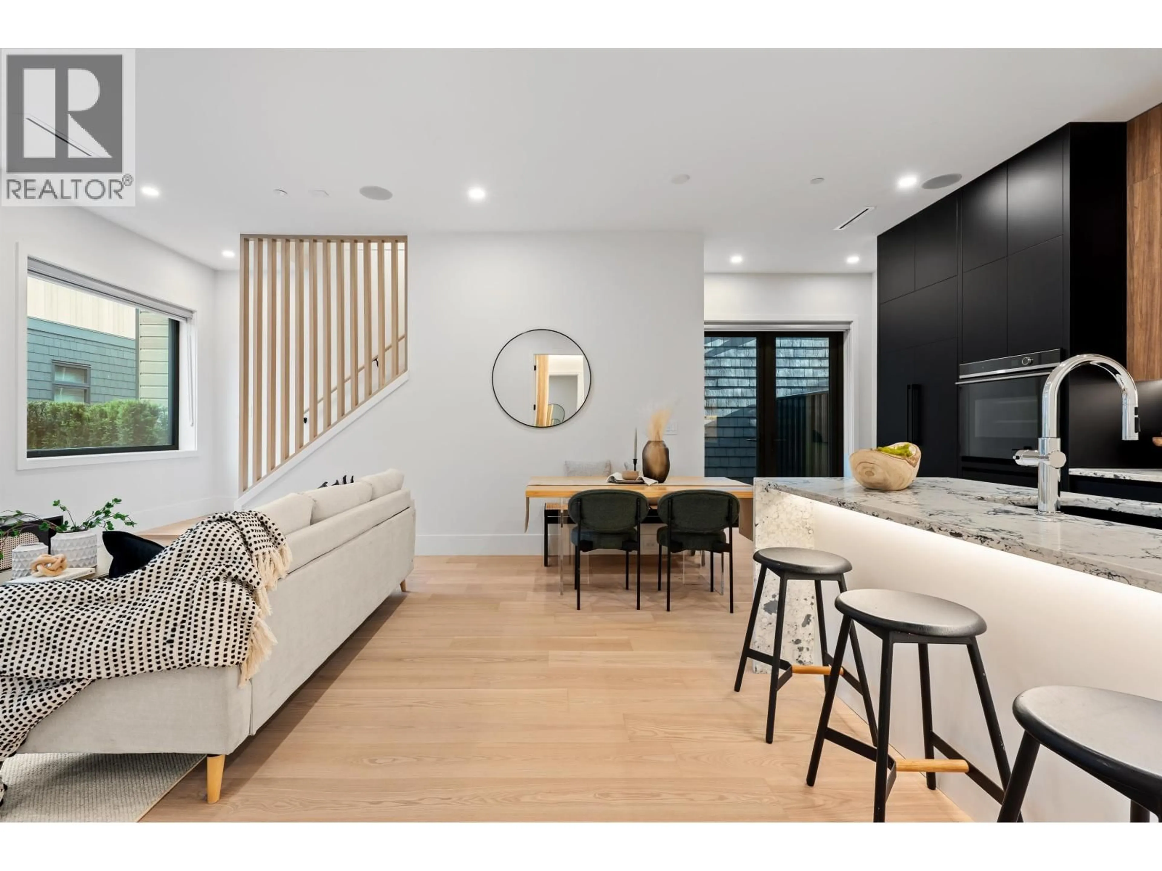 Living room with furniture, wood/laminate floor for 2 - 5034 GRANVILLE STREET, Vancouver British Columbia V6M3B4