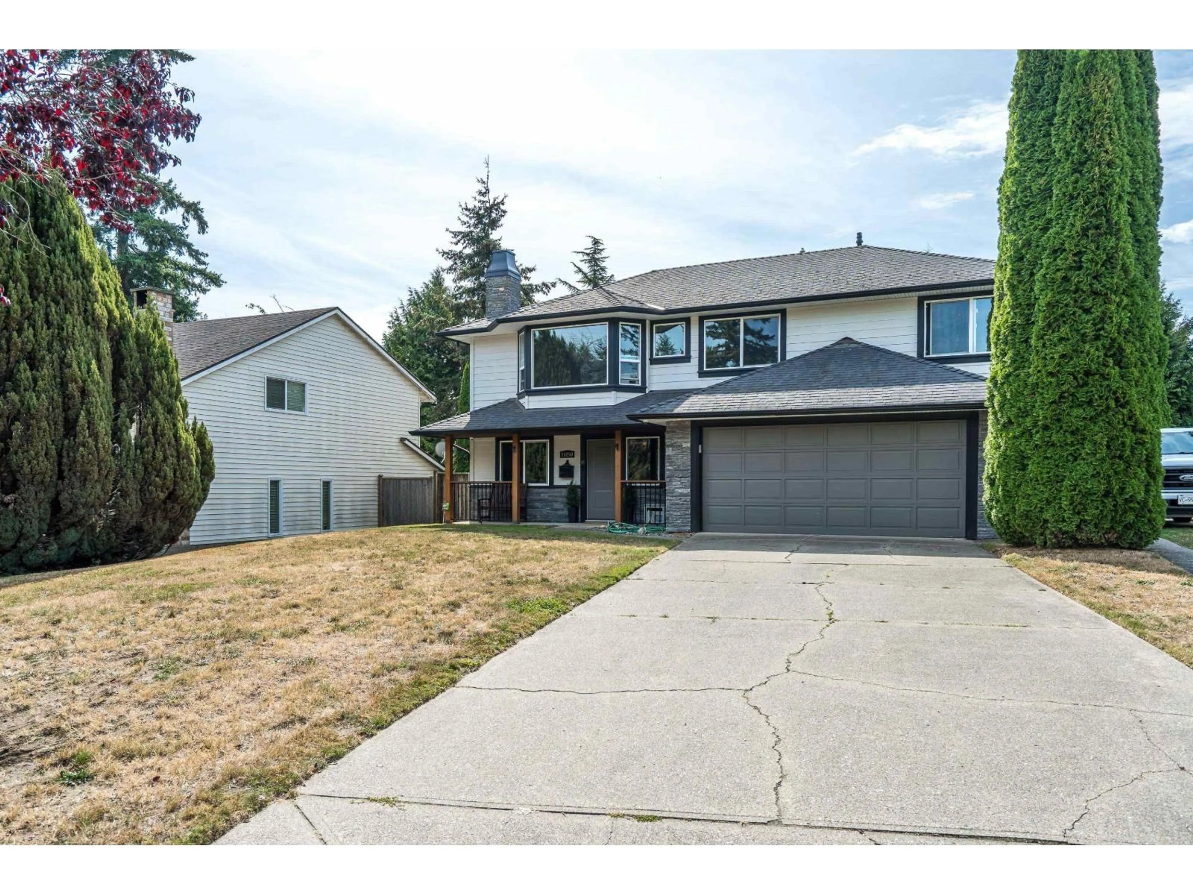 Home with vinyl exterior material, street for 15250 21B AVENUE, Surrey British Columbia V4A7S3