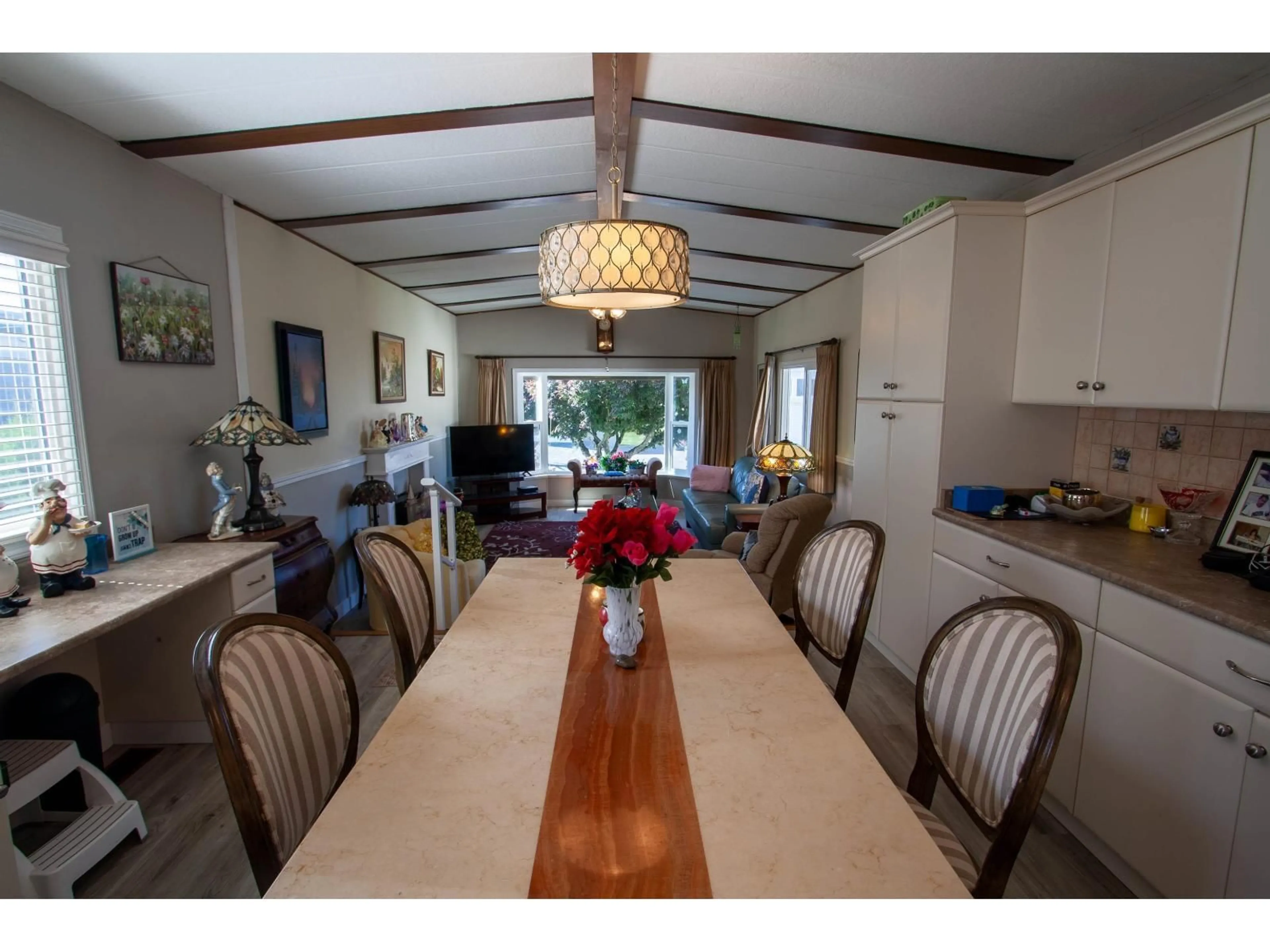 Dining room, wood/laminate floor for 136 - 6338 VEDDER ROAD, Sardis British Columbia V2R1C6