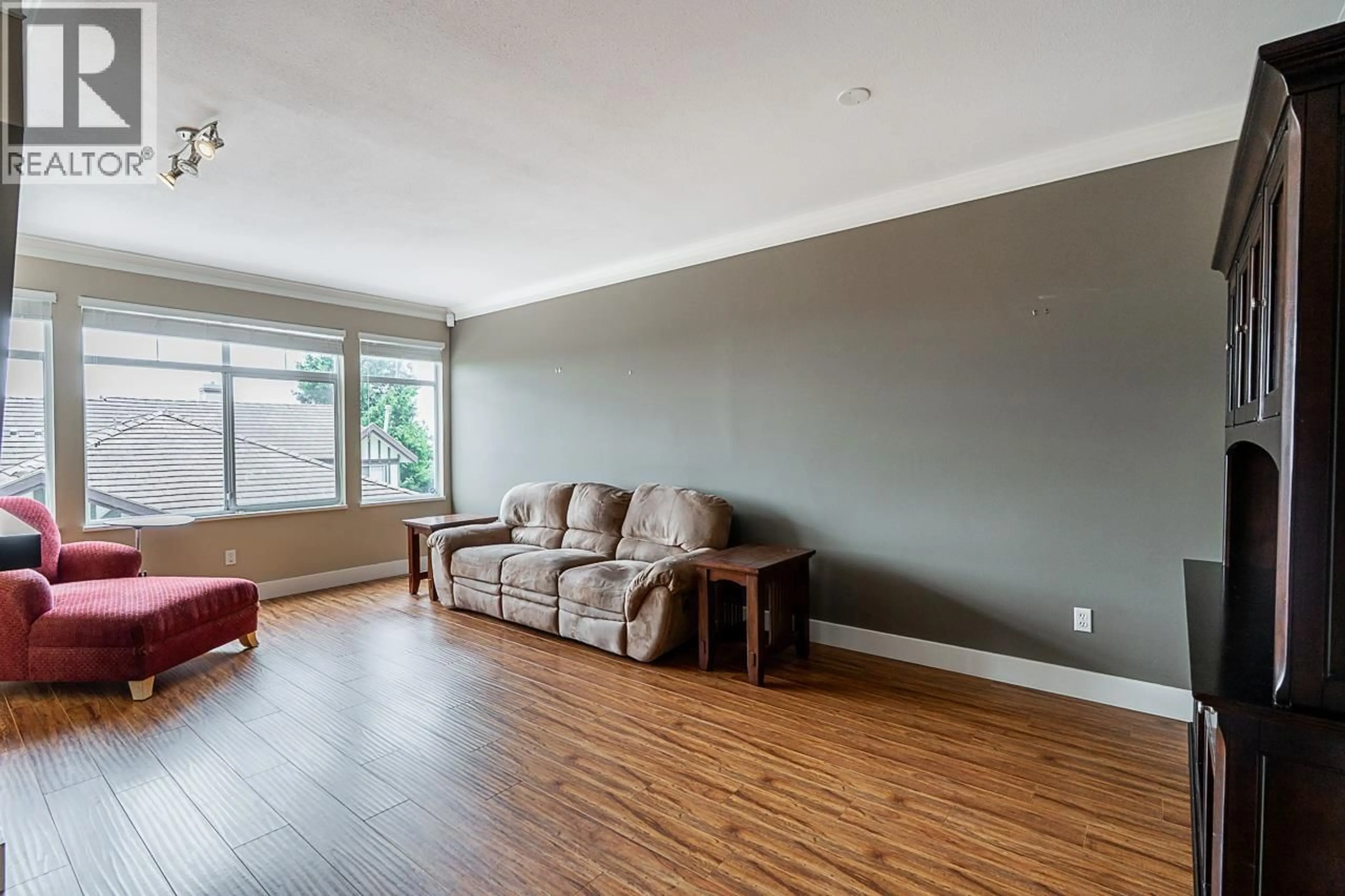 Living room with furniture, wood/laminate floor for 44 - 1486 JOHNSON STREET, Coquitlam British Columbia V3E3J9