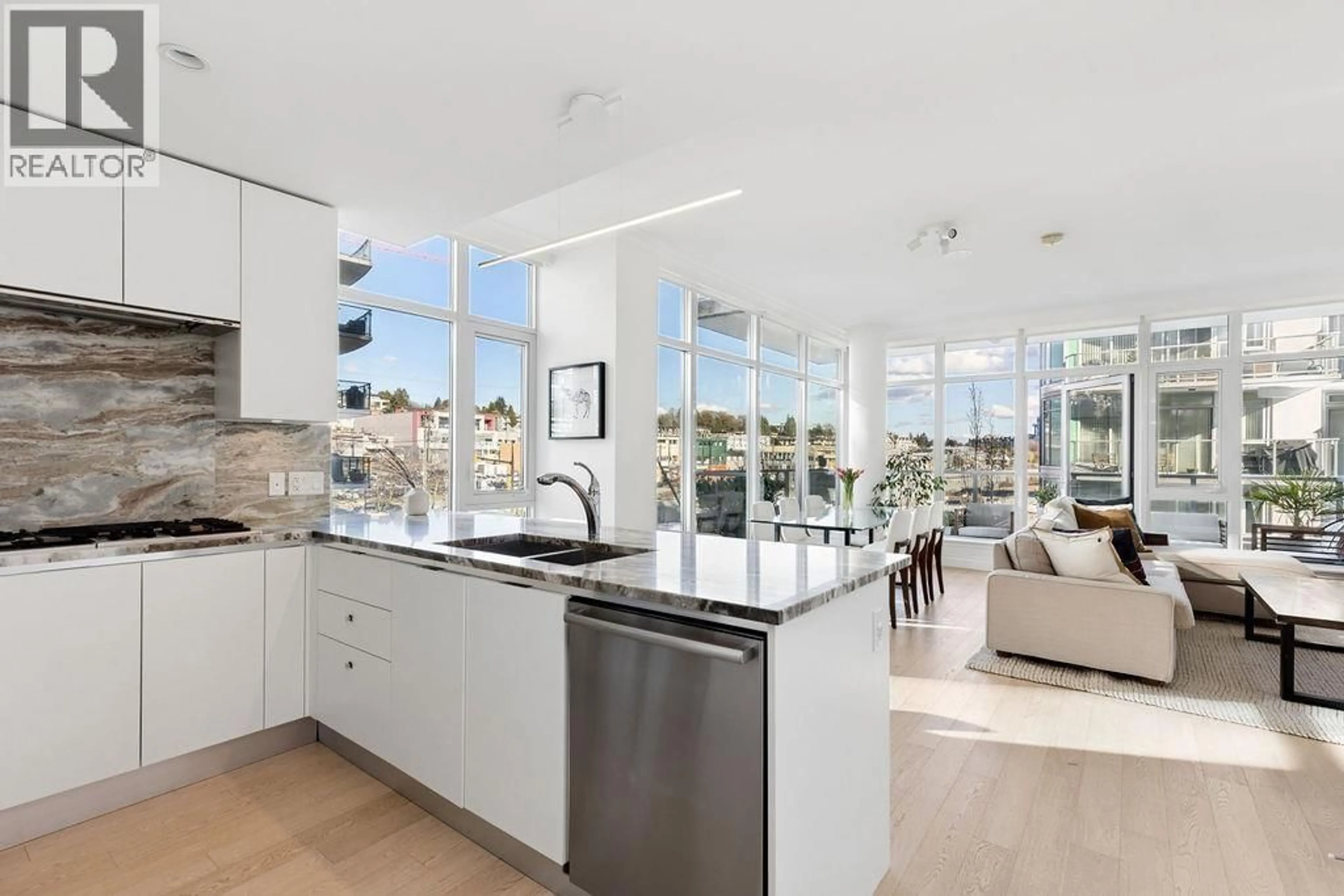 Open concept kitchen, ceramic/tile floor for 409 - 185 VICTORY SHIP WAY, North Vancouver British Columbia V7L0G2