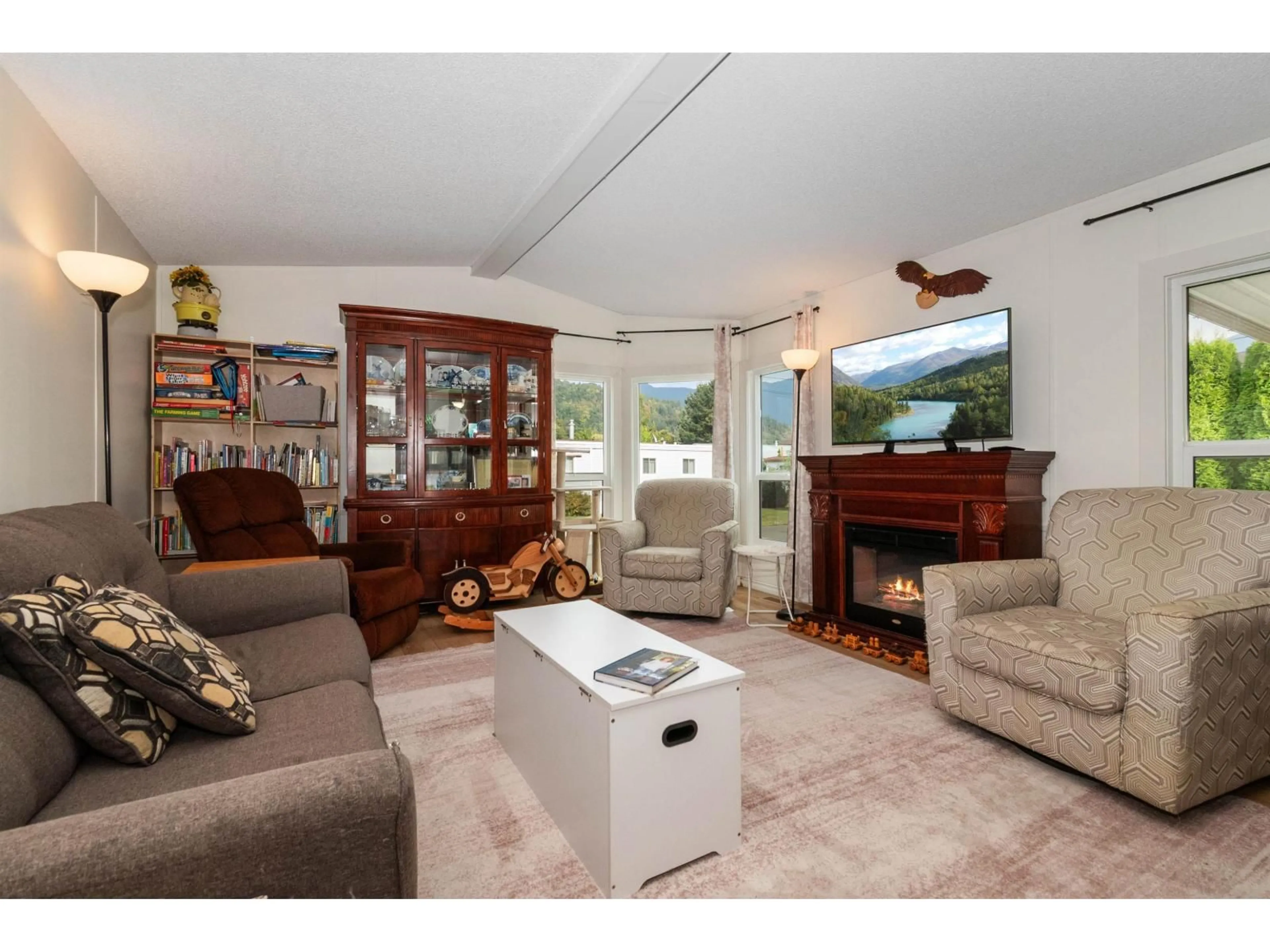 Living room with furniture, wood/laminate floor for 22 - 6900 INKMAN ROAD, Agassiz British Columbia V0M1A1