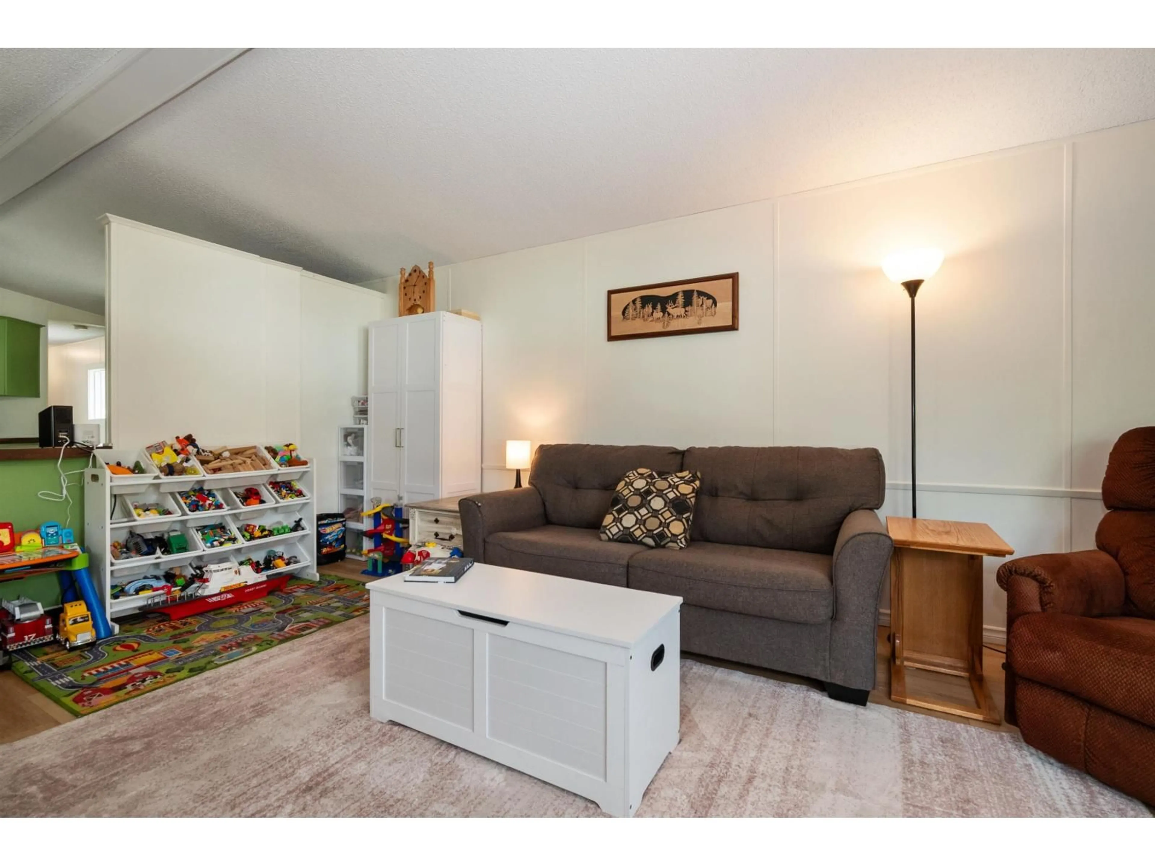Living room with furniture, wood/laminate floor for 22 - 6900 INKMAN ROAD, Agassiz British Columbia V0M1A1