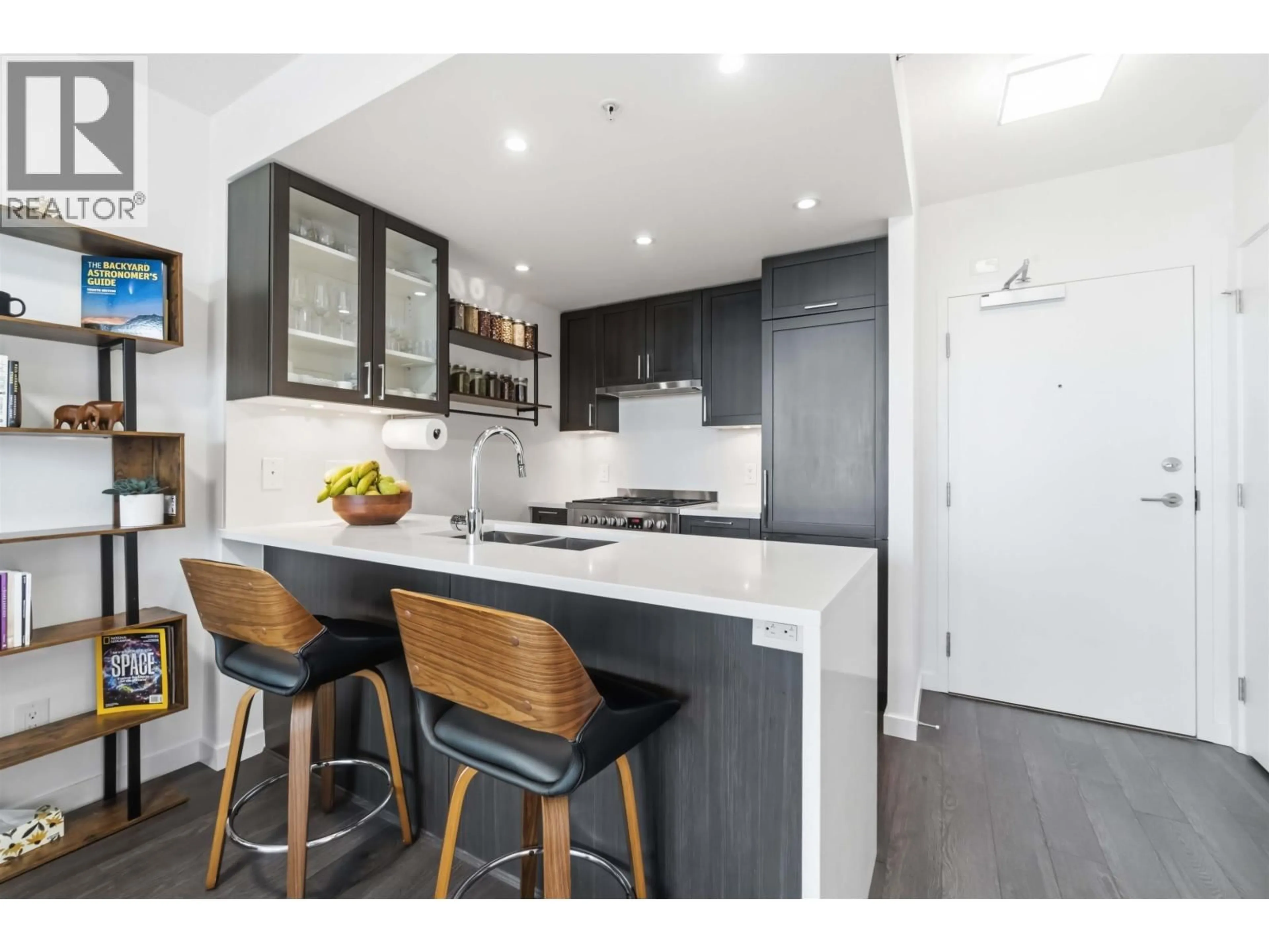 Open concept kitchen, wood/laminate floor for 615 - 5598 ORMIDALE STREET, Vancouver British Columbia V5R0E5