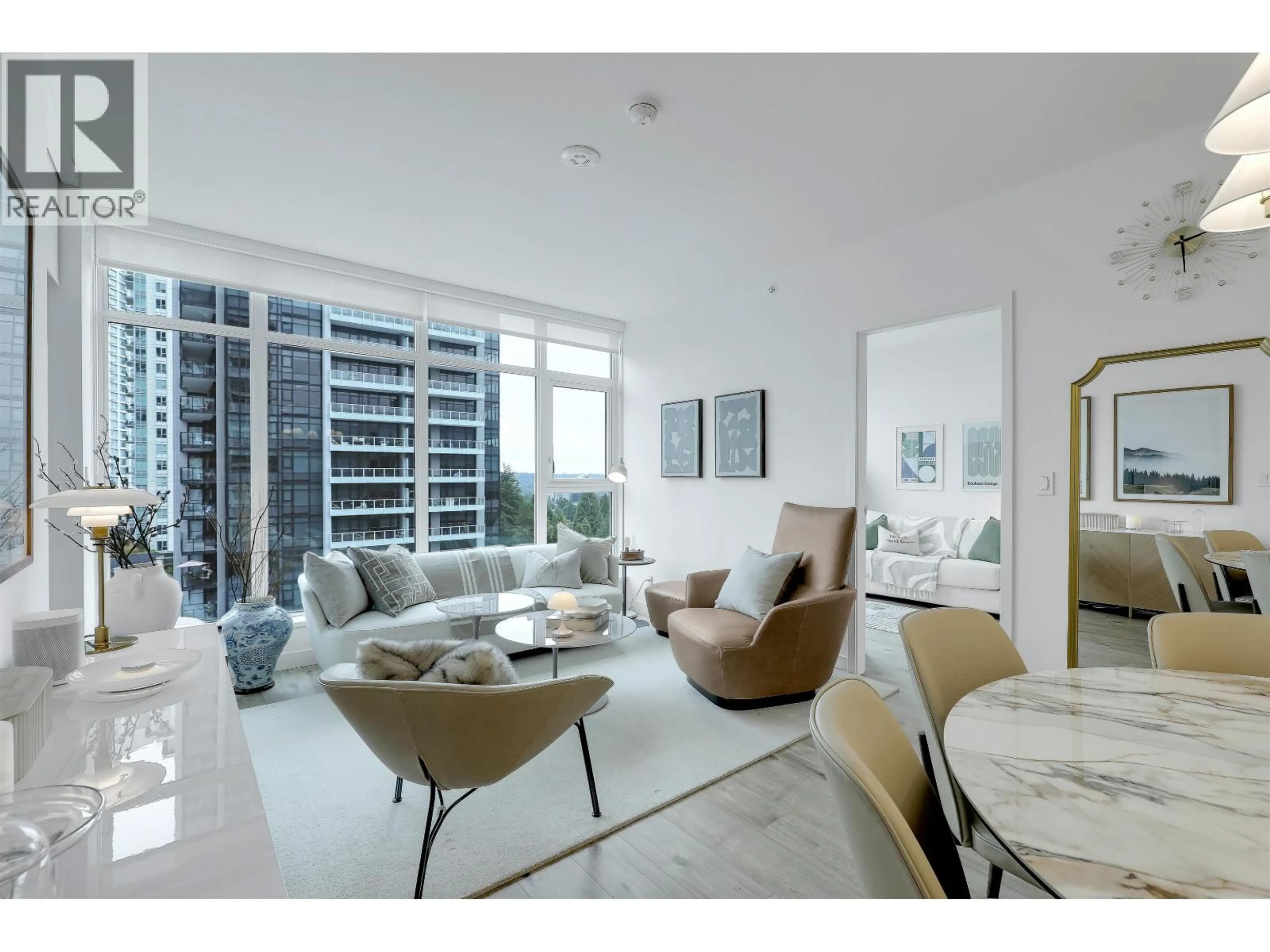 Living room with furniture, unknown for 606 - 720 FARROW STREET, Coquitlam British Columbia V3J0P3