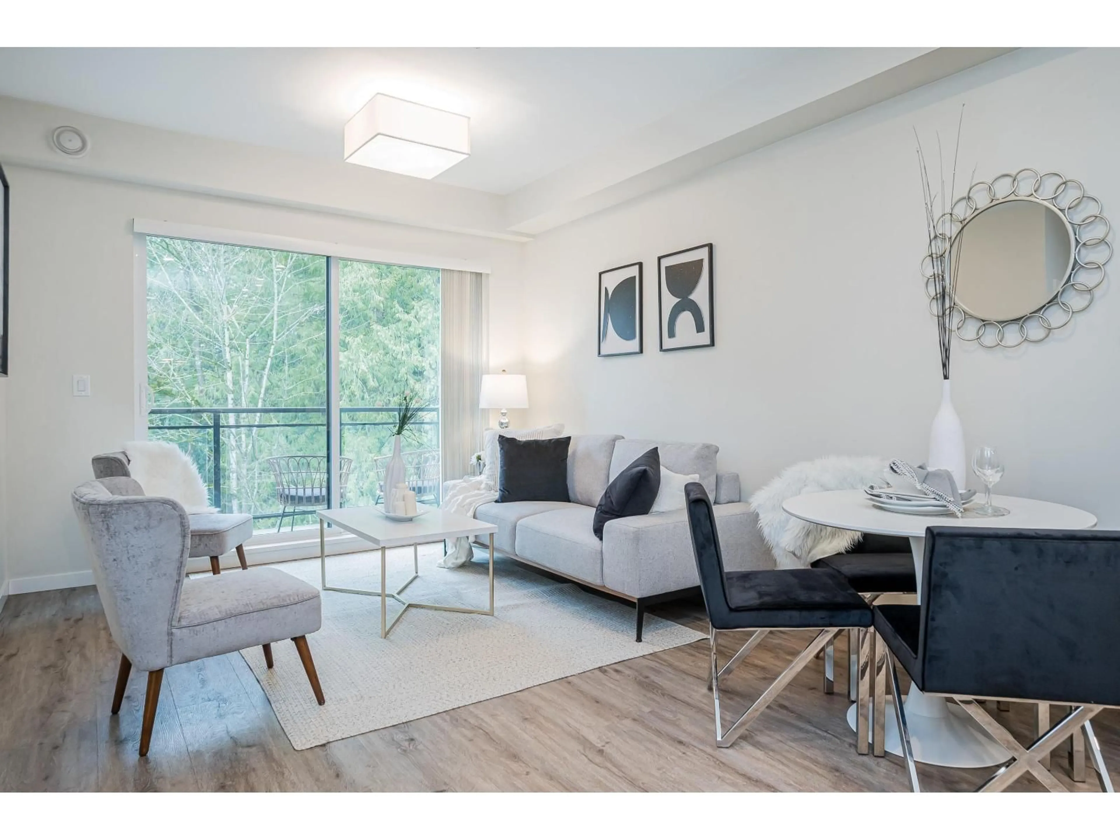 Living room with furniture, wood/laminate floor for A308 - 20087 68 AVENUE, Langley British Columbia V2Y0Y2