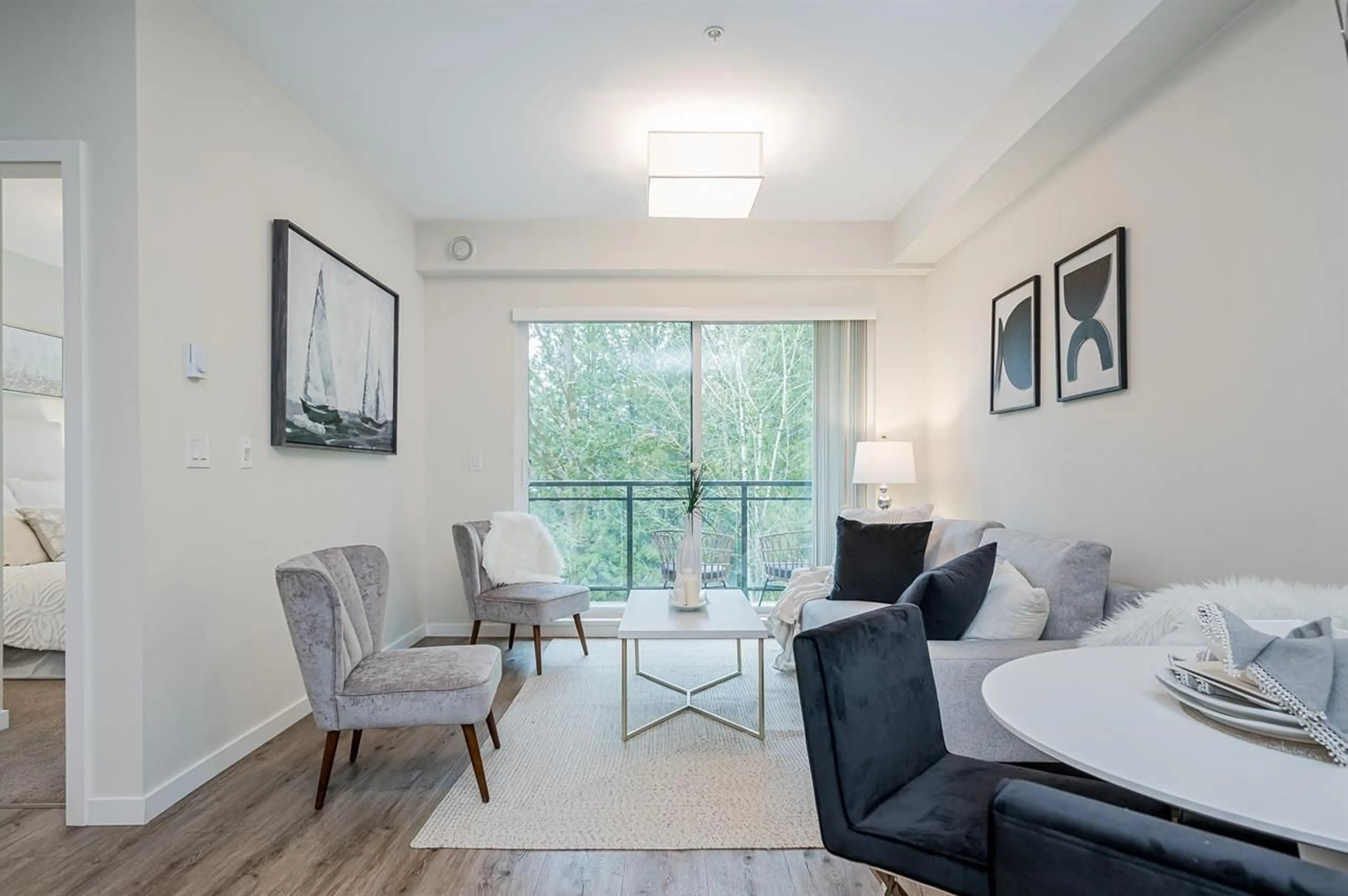 Living room with furniture, wood/laminate floor for A308 - 20087 68 AVENUE, Langley British Columbia V2Y0Y2