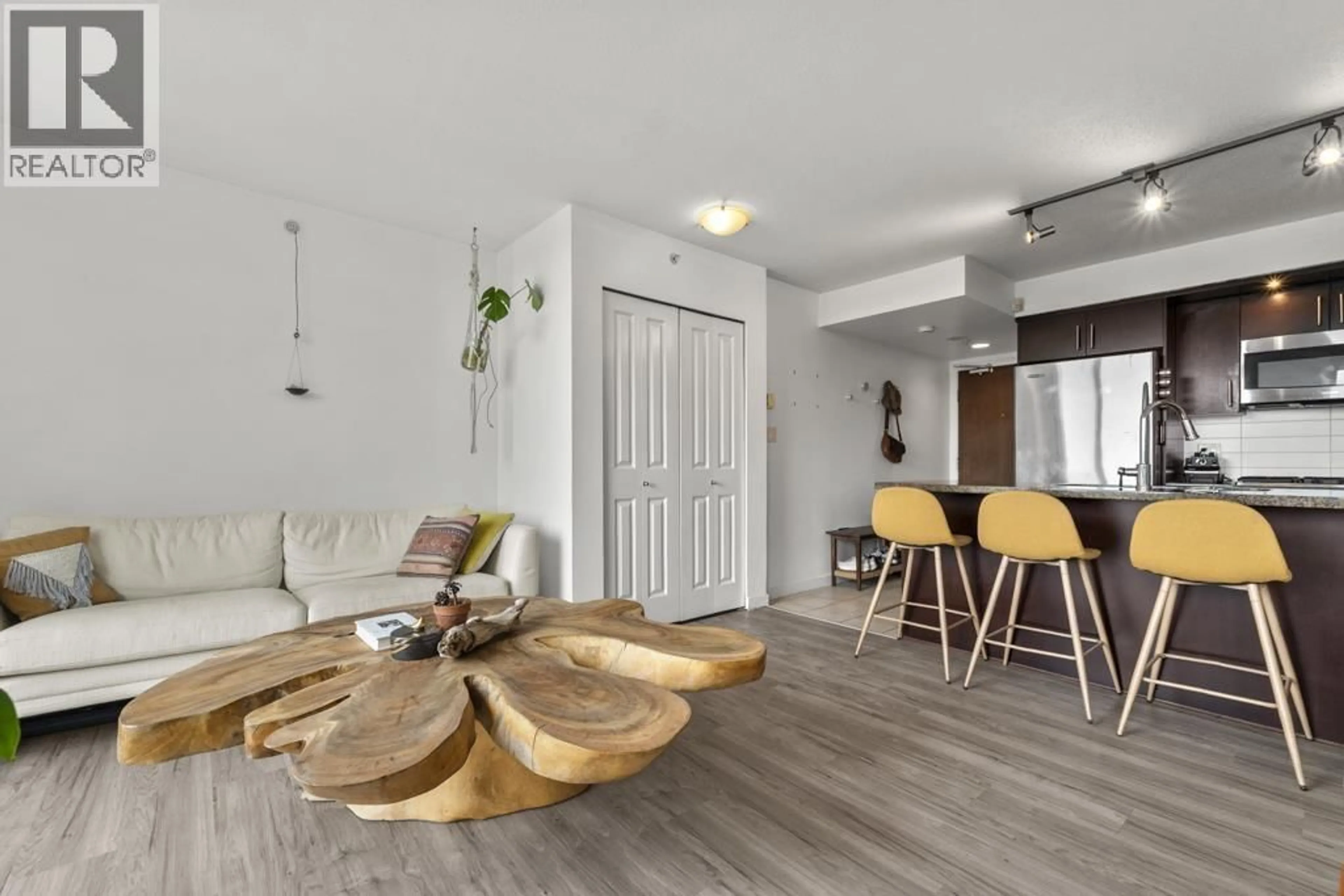 Living room with furniture, wood/laminate floor for 1003 - 1650 7TH AVENUE, Vancouver British Columbia V6J5N1