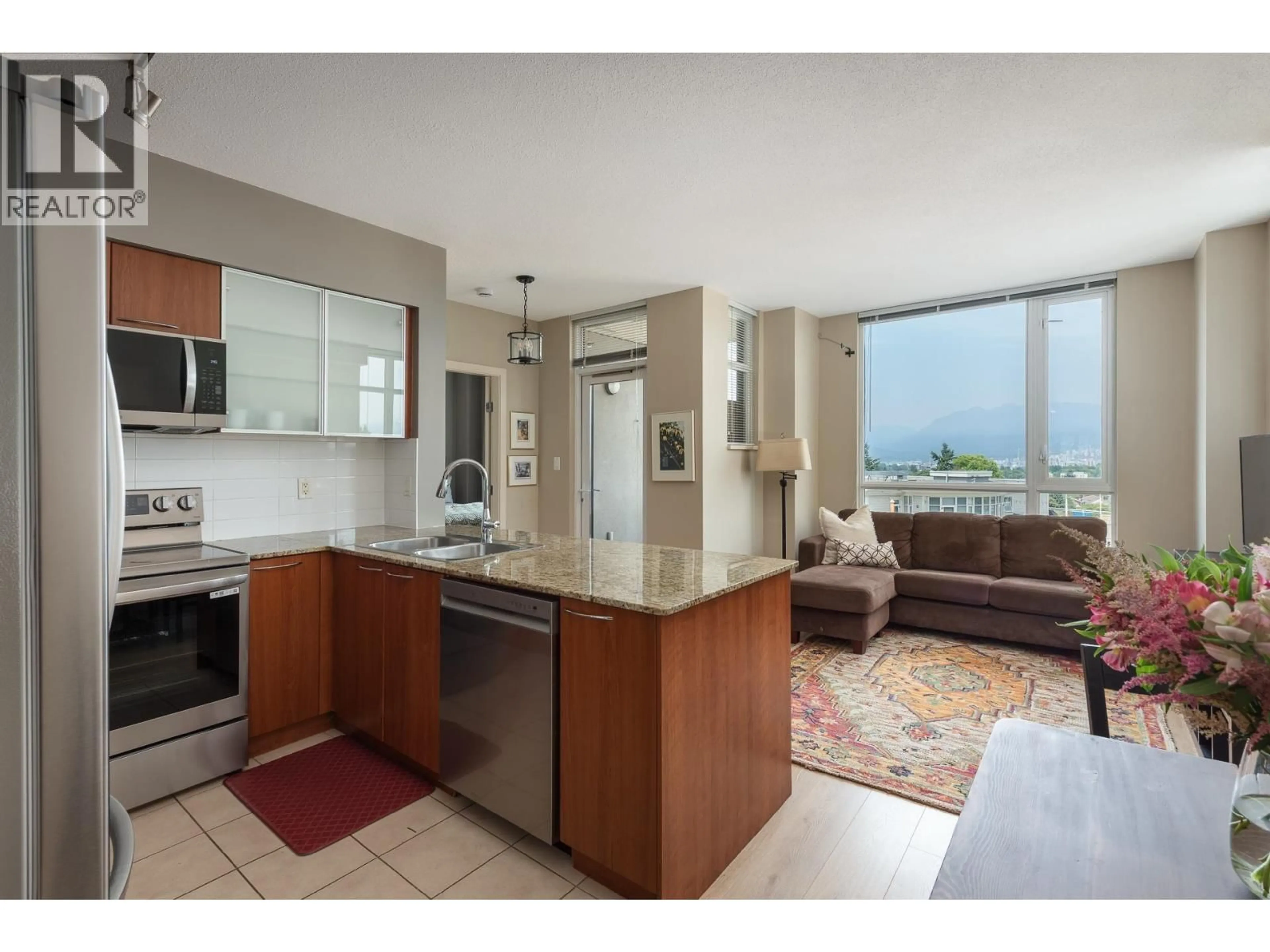 Open concept kitchen, unknown for 656 - 1483 KING EDWARD AVENUE, Vancouver British Columbia V5N5Z3