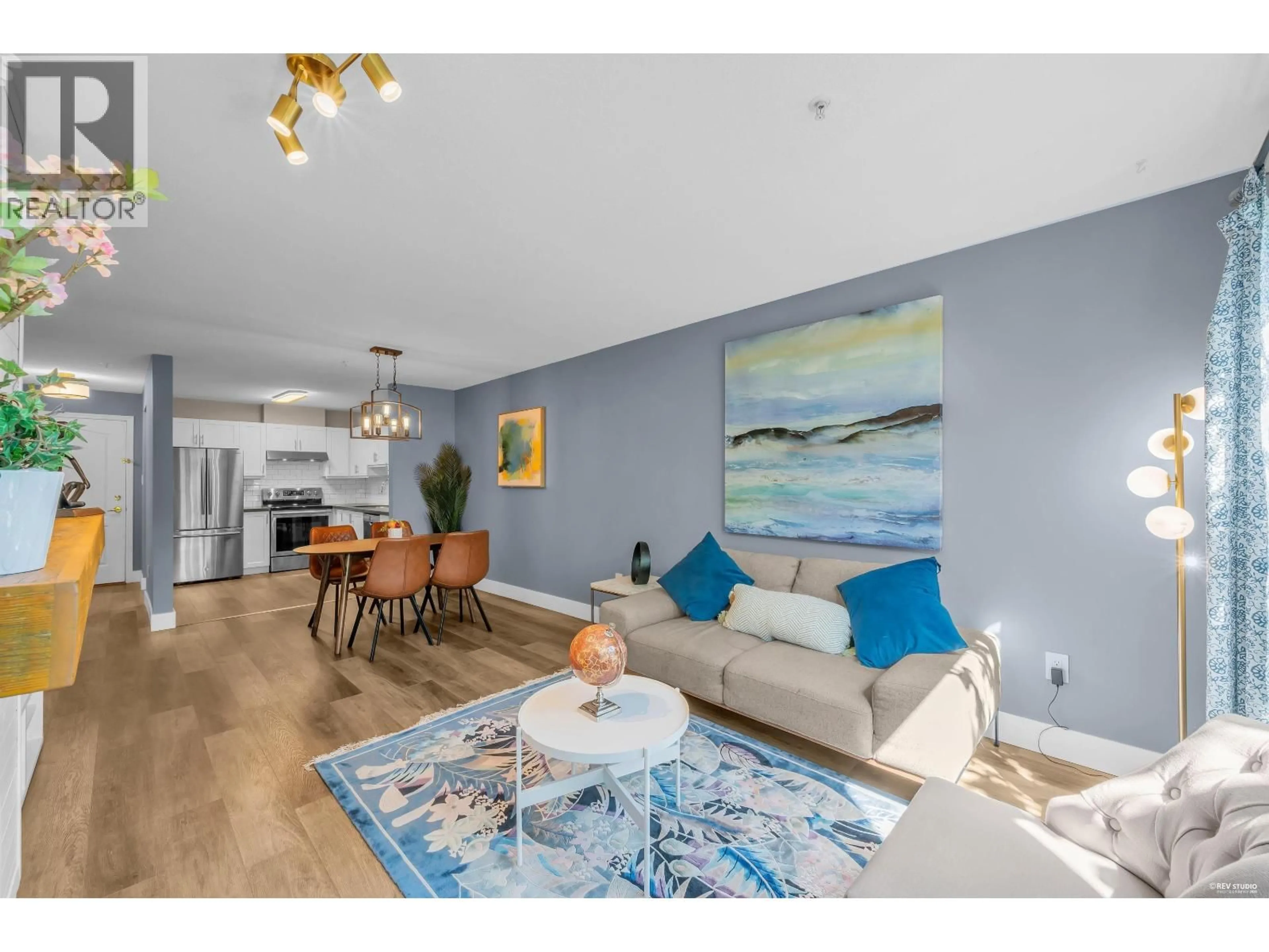 Living room with furniture, unknown for 105 - 2558 PARKVIEW LANE, Port Coquitlam British Columbia V3C6L8