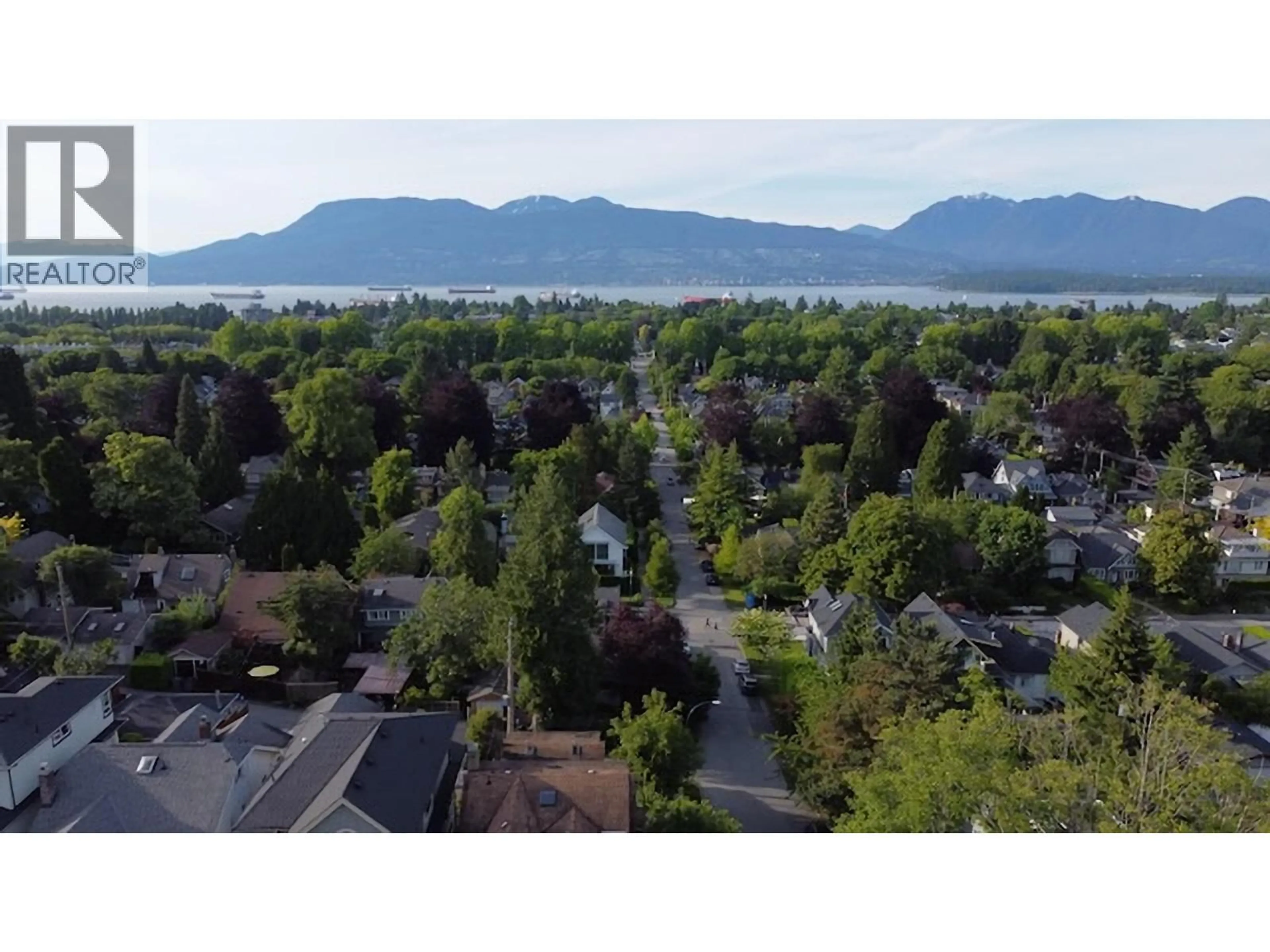 A pic from outside/outdoor area/front of a property/back of a property/a pic from drone, mountain view for 3131 COLLINGWOOD STREET, Vancouver British Columbia V6R3L5